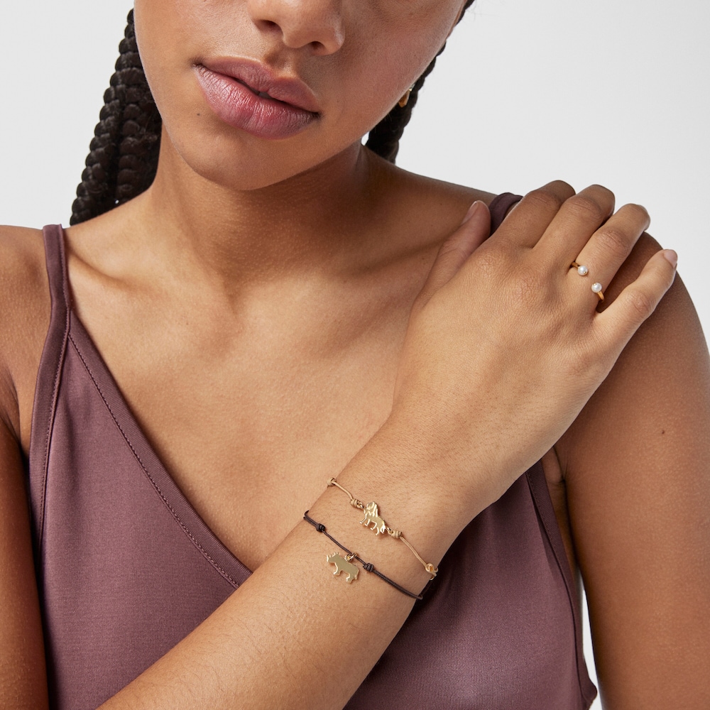 Pulsera león con baño de oro 18 kt sobre plata y cordón beige Save