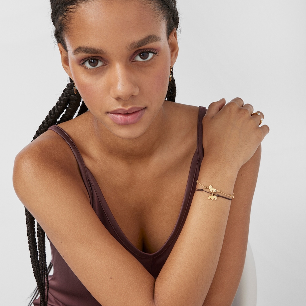 Pulsera león con baño de oro 18 kt sobre plata y cordón beige Save