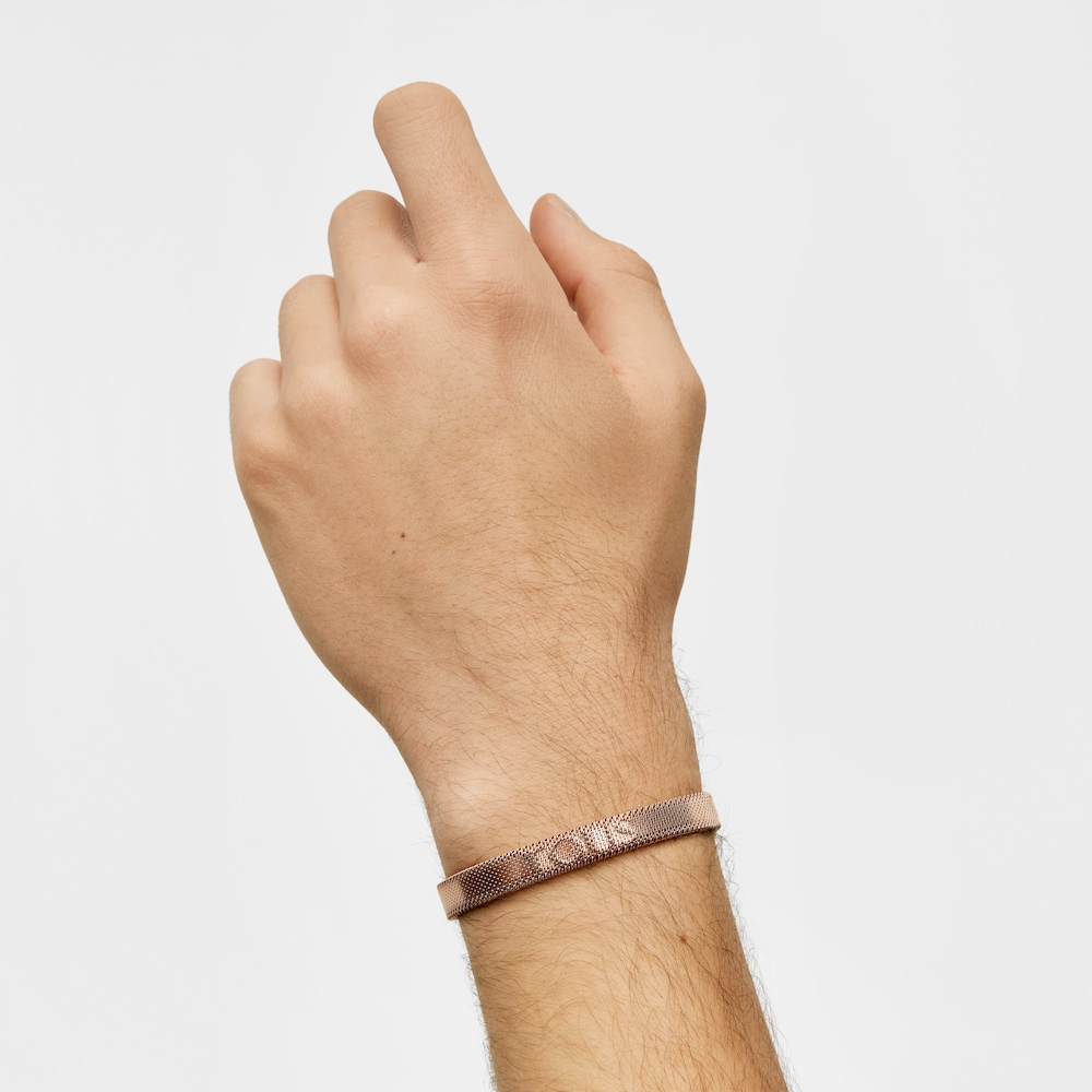 Pulsera de acero IP rosado con letras TOUS en relieve. 0,6cm. TOUS Mesh