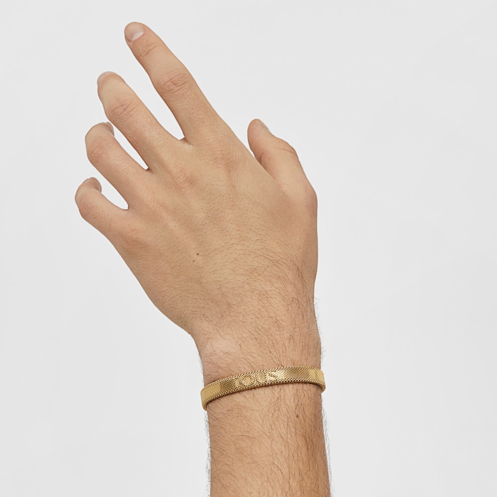 Pulsera de acero IP dorado con letras TOUS en relieve. 0,8cm. 17cm. TOUS Mesh