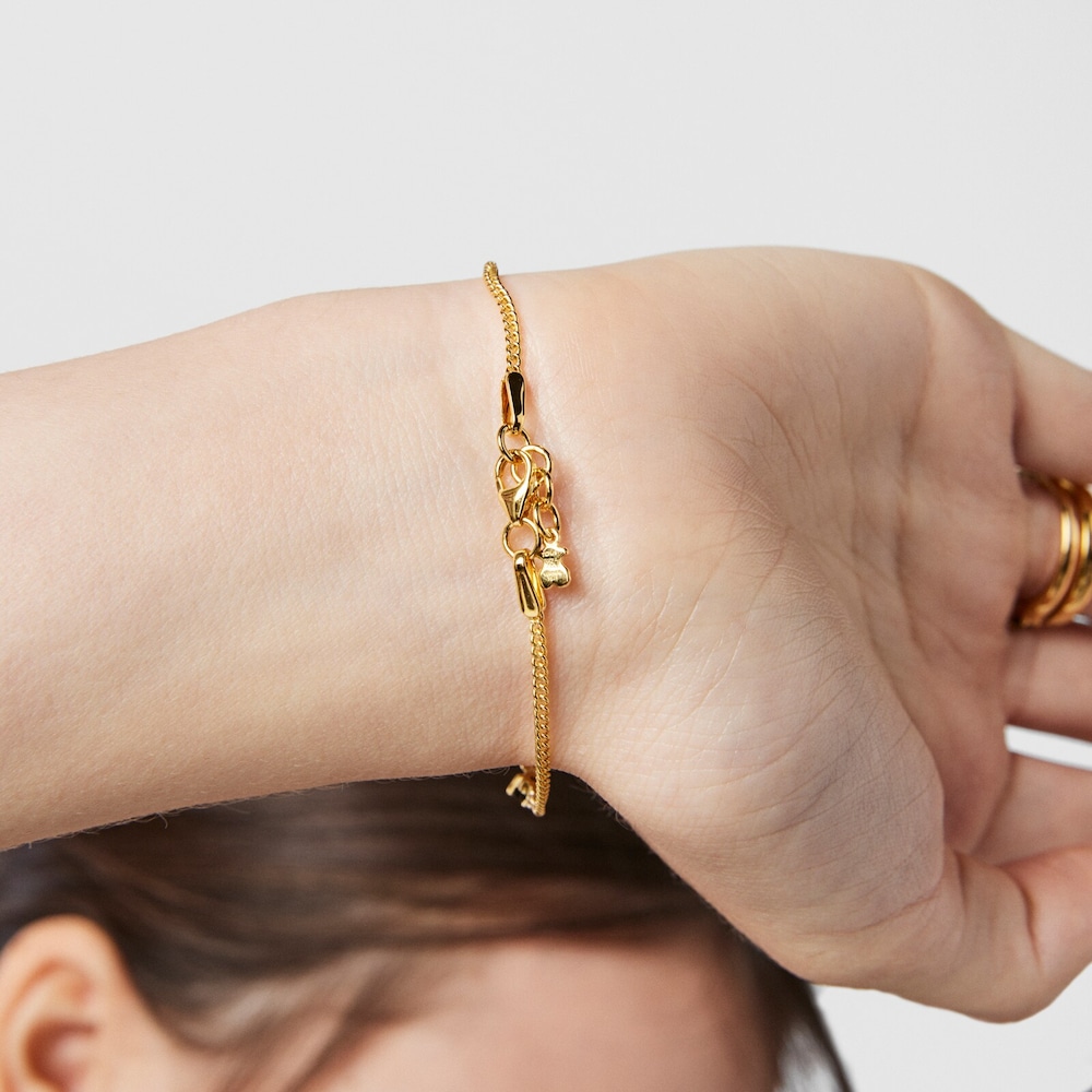 Pulsera Glaring con ba&ntilde;o de oro 18 kt sobre plata con &oacute;nix y zirc&oacute;n