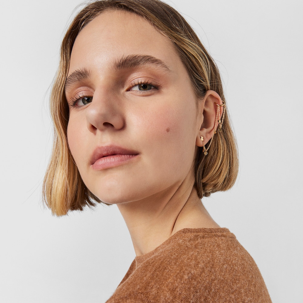 Earcuff&nbsp;con ba&ntilde;o de oro 18 kt sobre plata, con oso, estrella y coraz&oacute;n Cool Joy