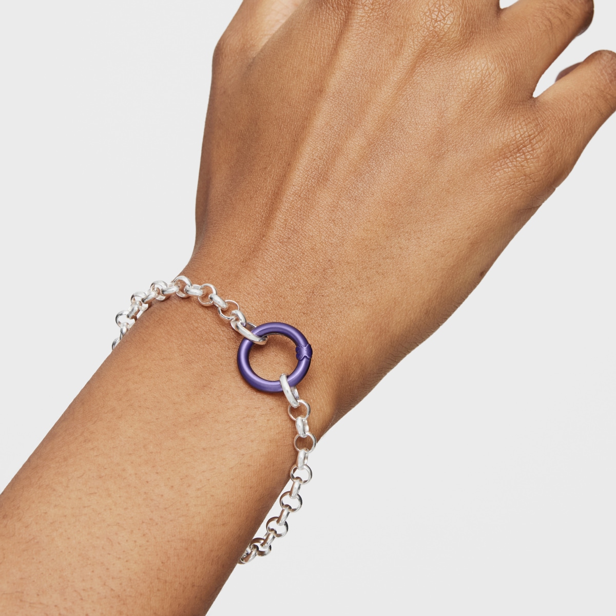 Small purple-colored silver Ring Hold