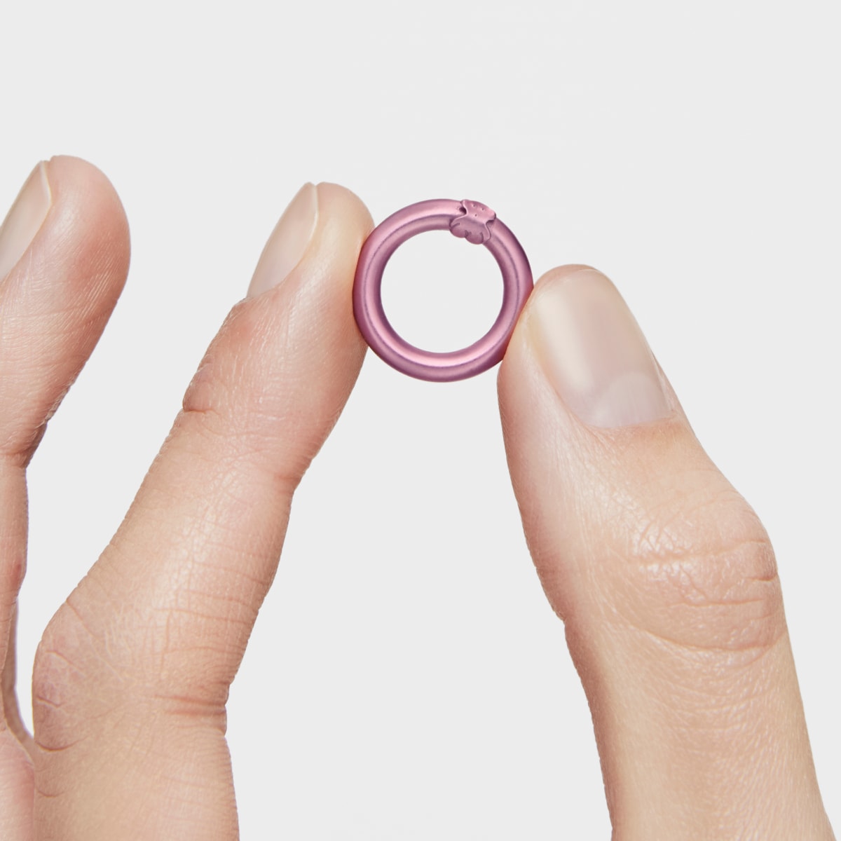 Small pink-colored silver Ring Hold