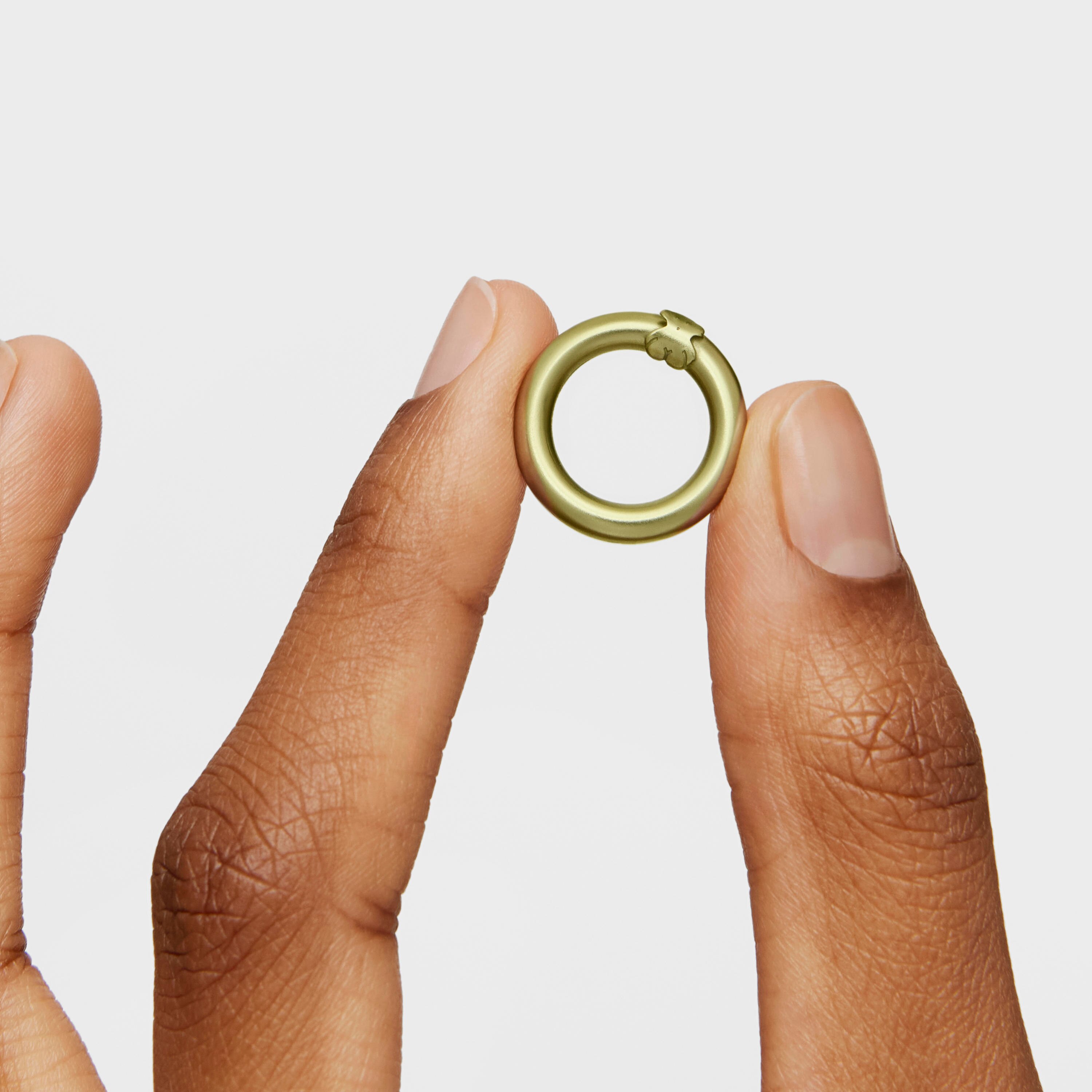 green-colored silver Ring Hold