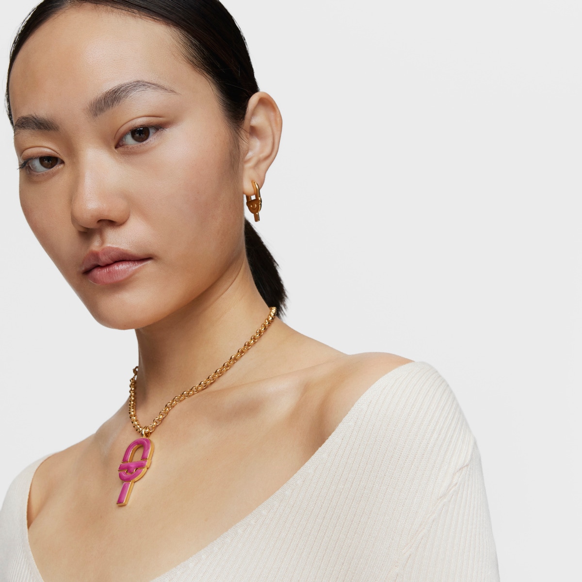 Large Pendant with 18kt gold plating over silver and fuchsia-colored enamel TOUS MANIFESTO