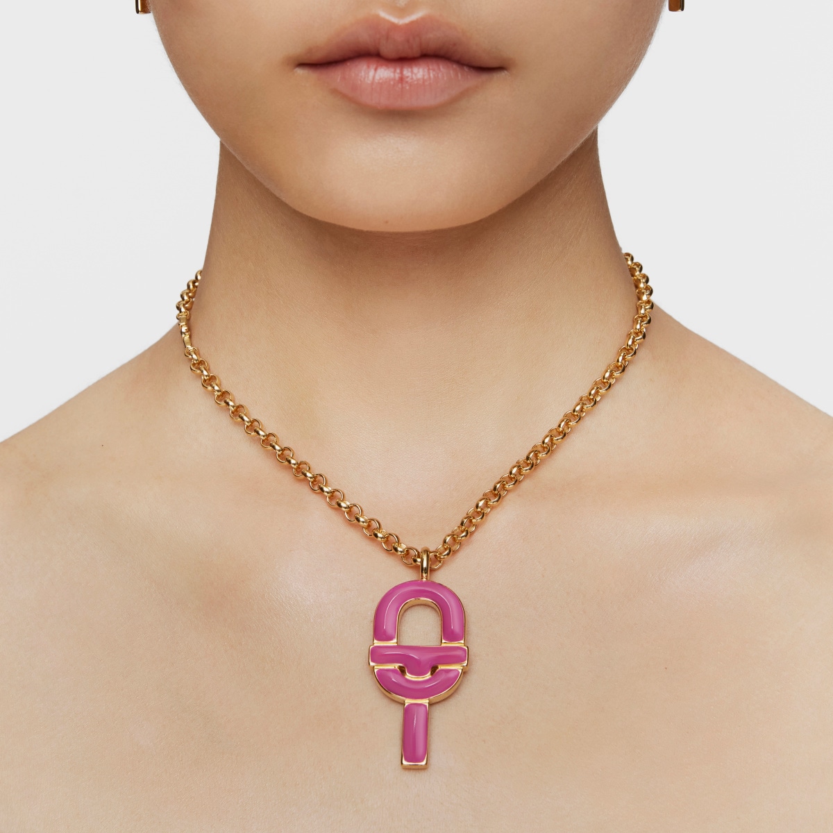 Large Pendant with 18kt gold plating over silver and fuchsia-colored enamel TOUS MANIFESTO