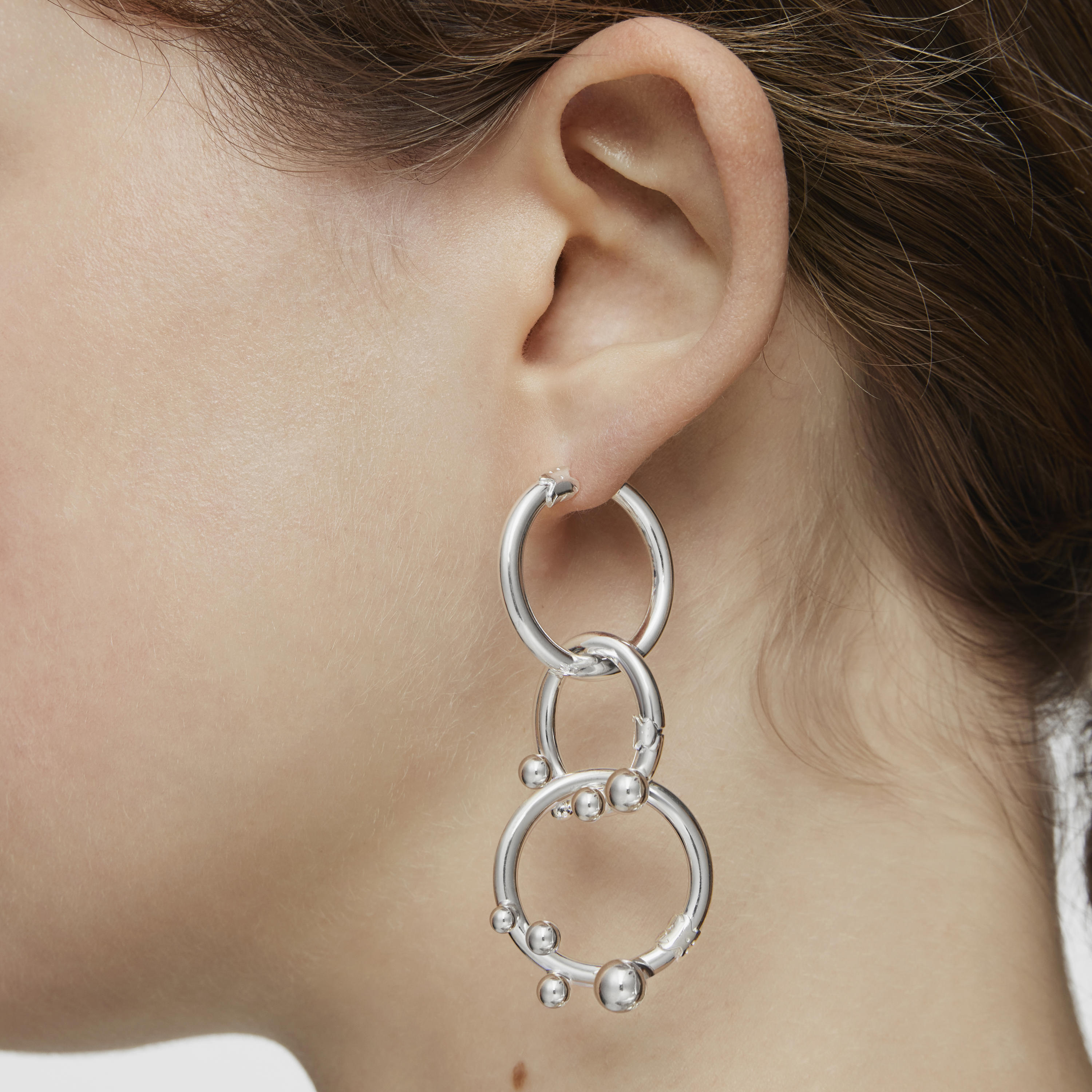 Short/long silver Earrings with rings and details Hold
