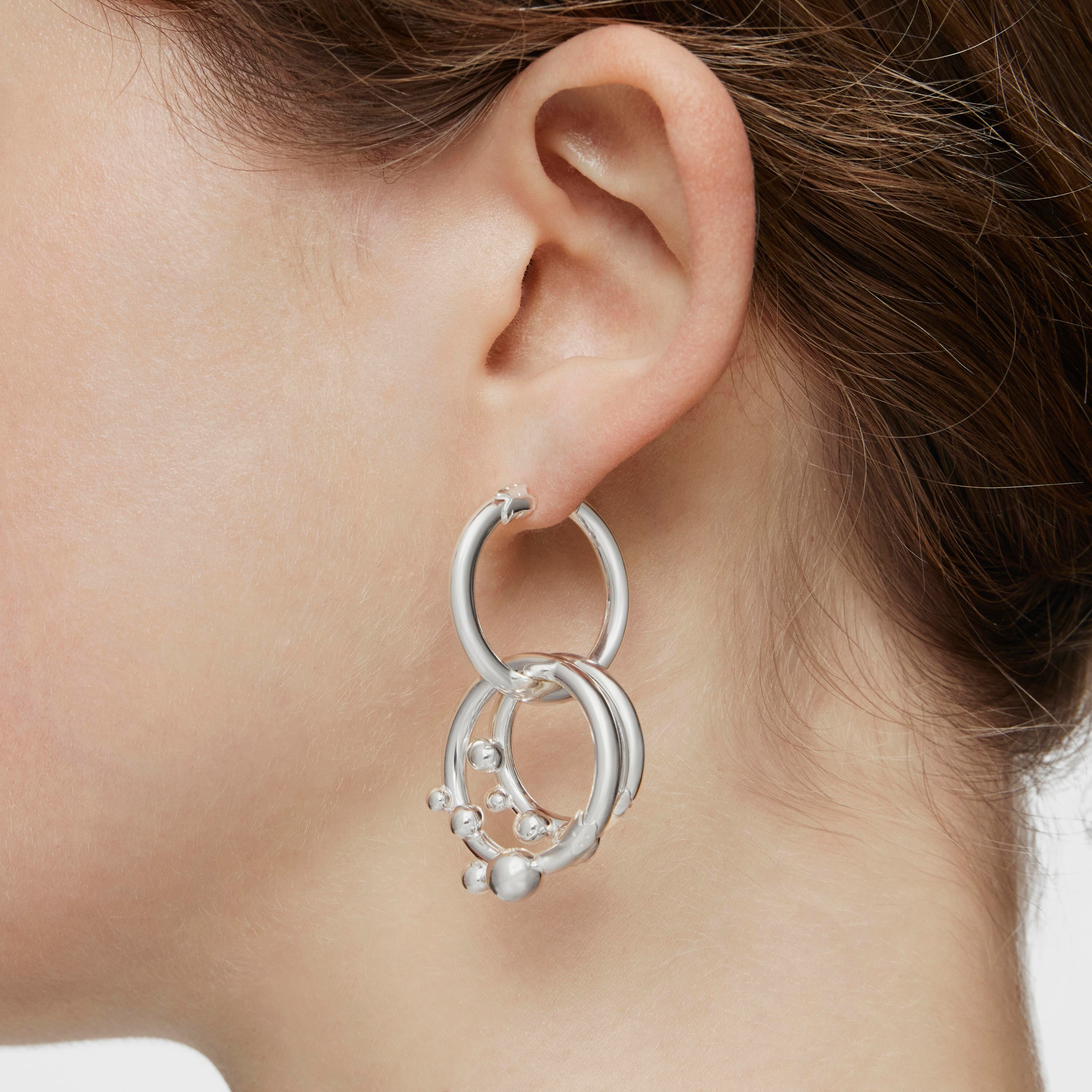 Short/long silver Earrings with rings and details Hold