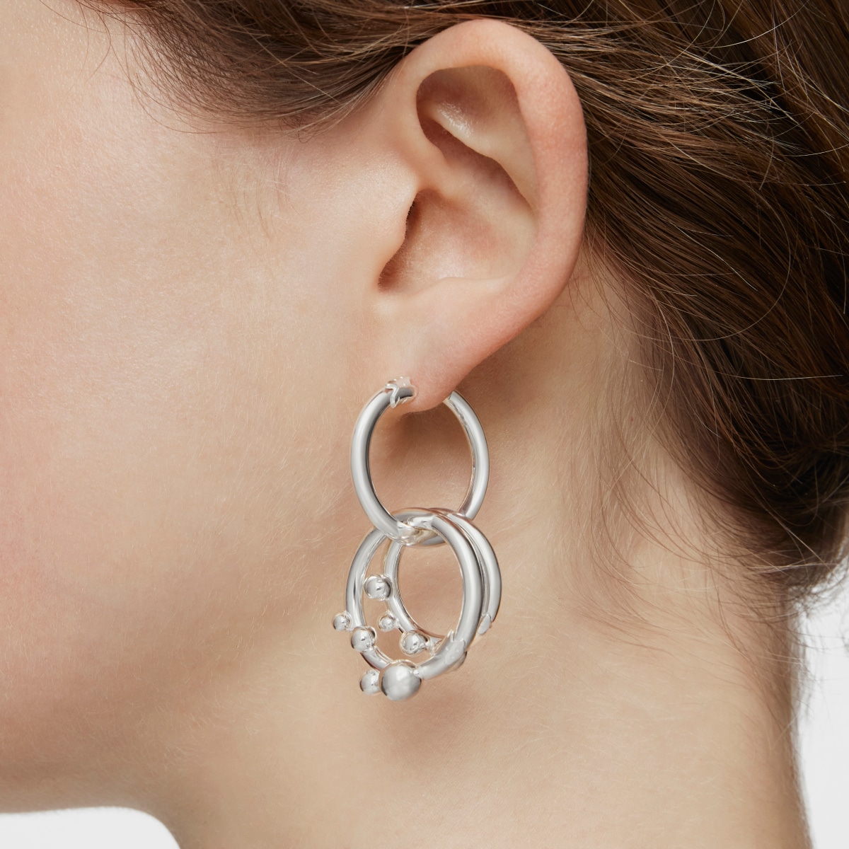 Short-long silver Earrings with rings and details Hold