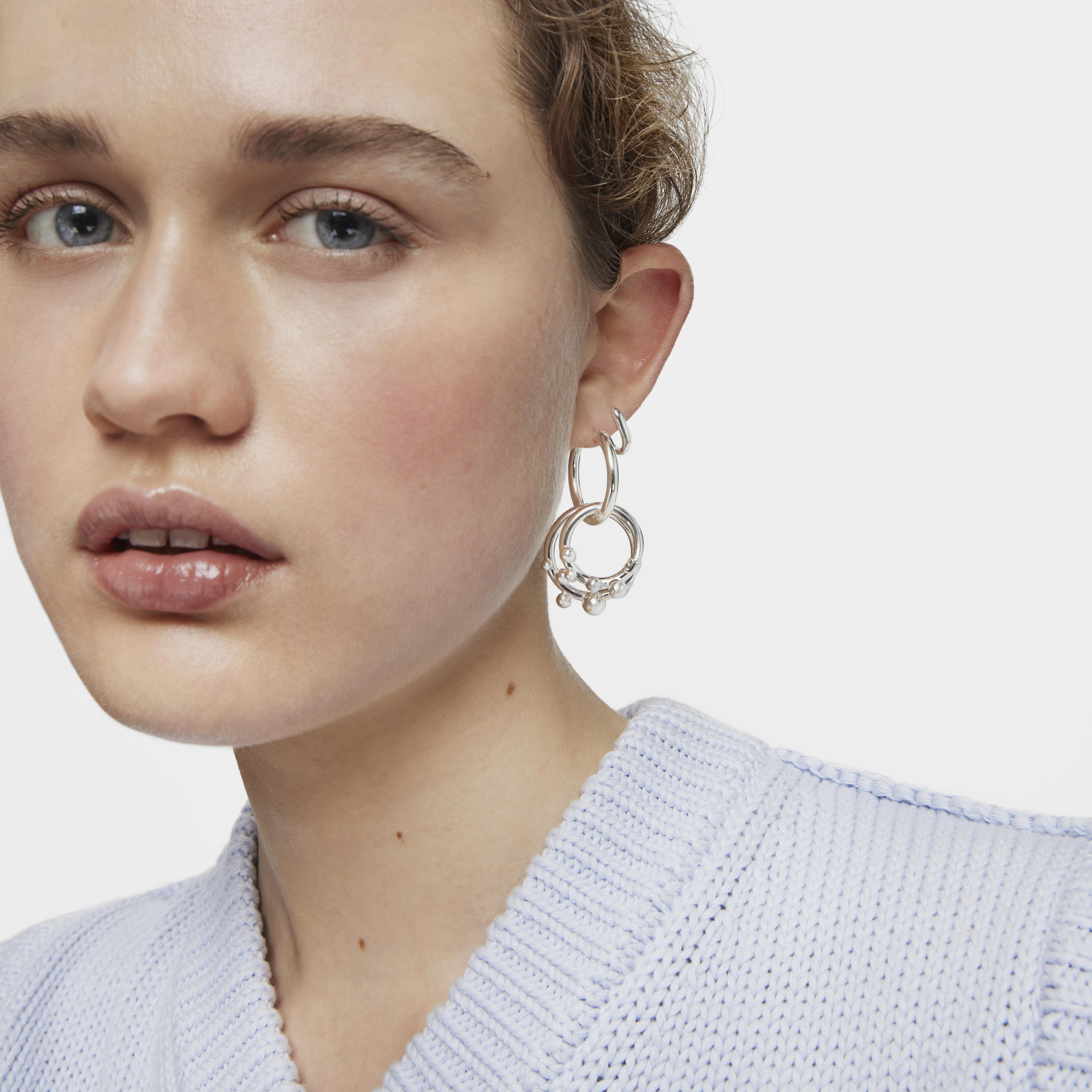 Short/long silver Earrings with rings and details Hold
