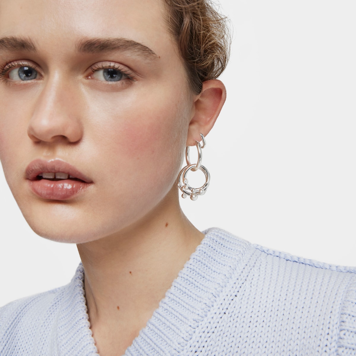 Short-long silver Earrings with rings and details Hold