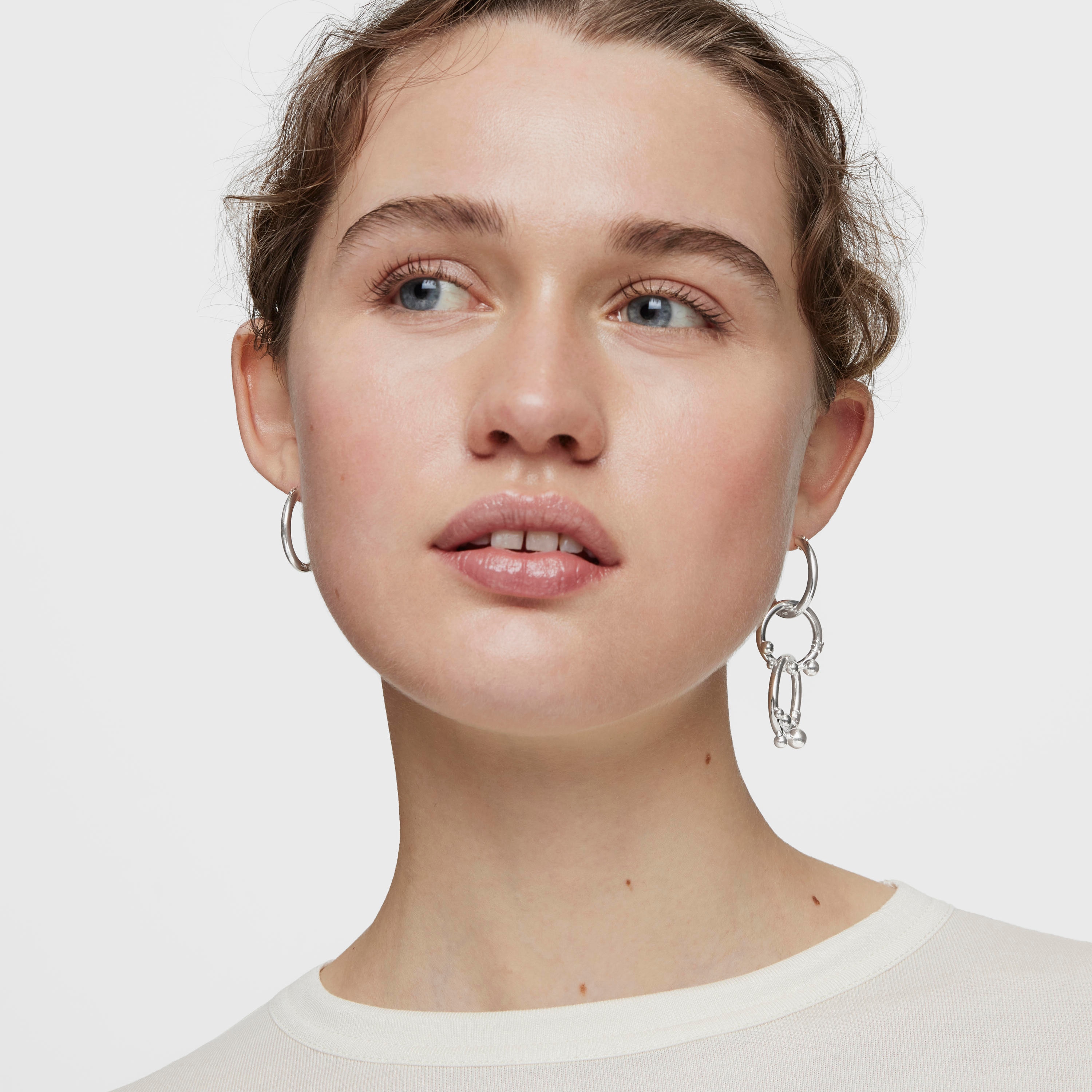 Short/long silver Earrings with rings and details Hold