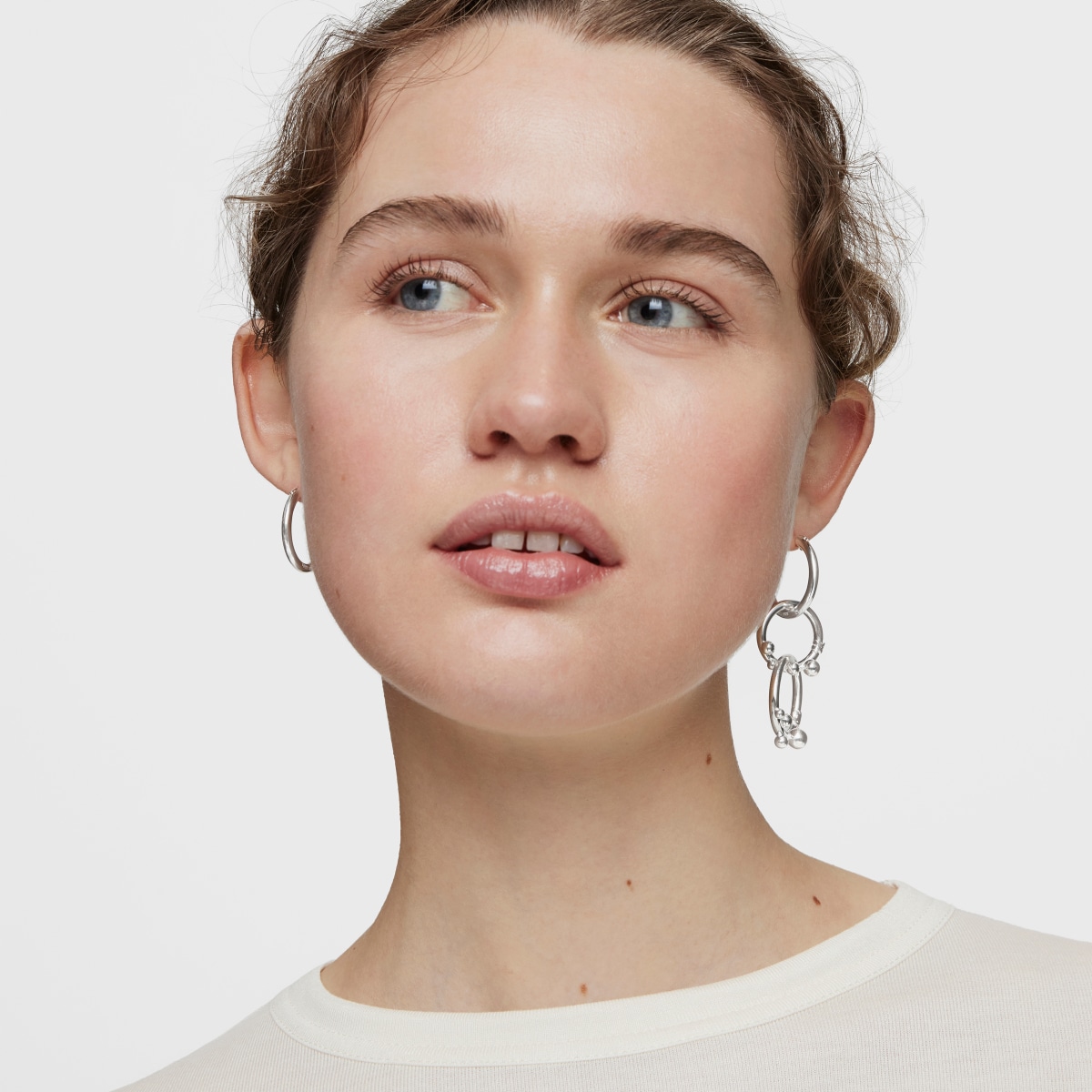 Short-long silver Earrings with rings and details Hold