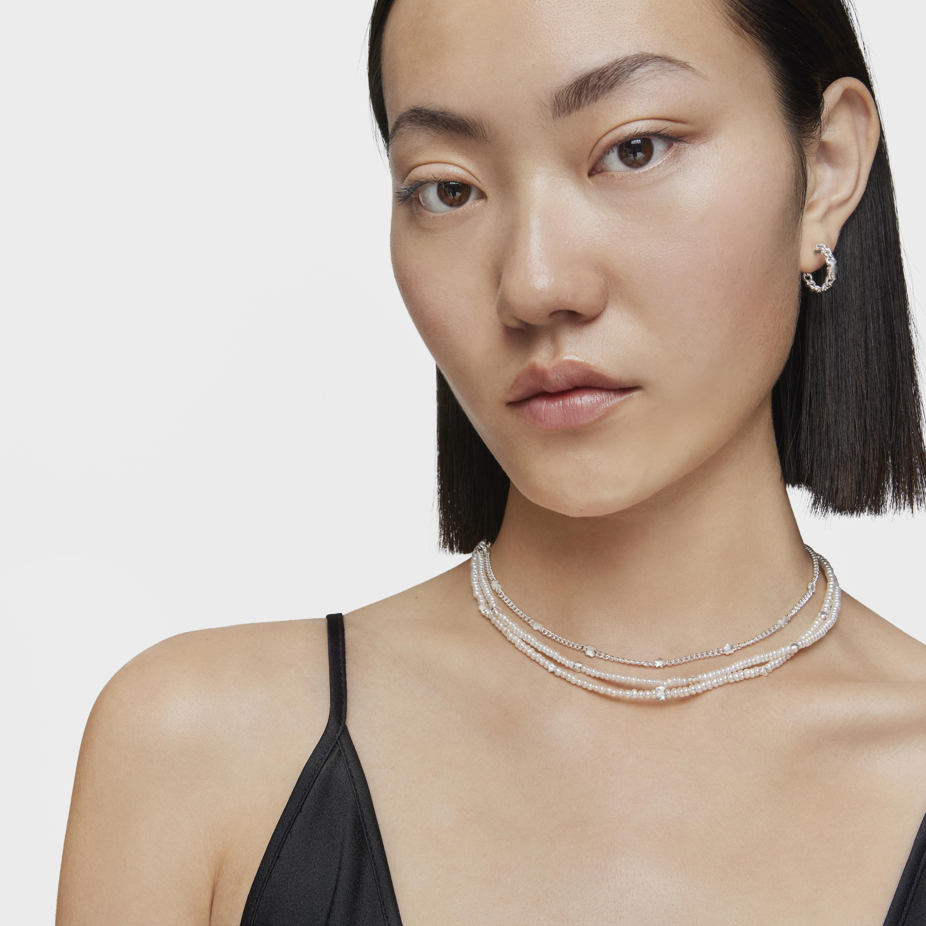 Short cultured pearl Necklace with motifs in silver Bold Motif