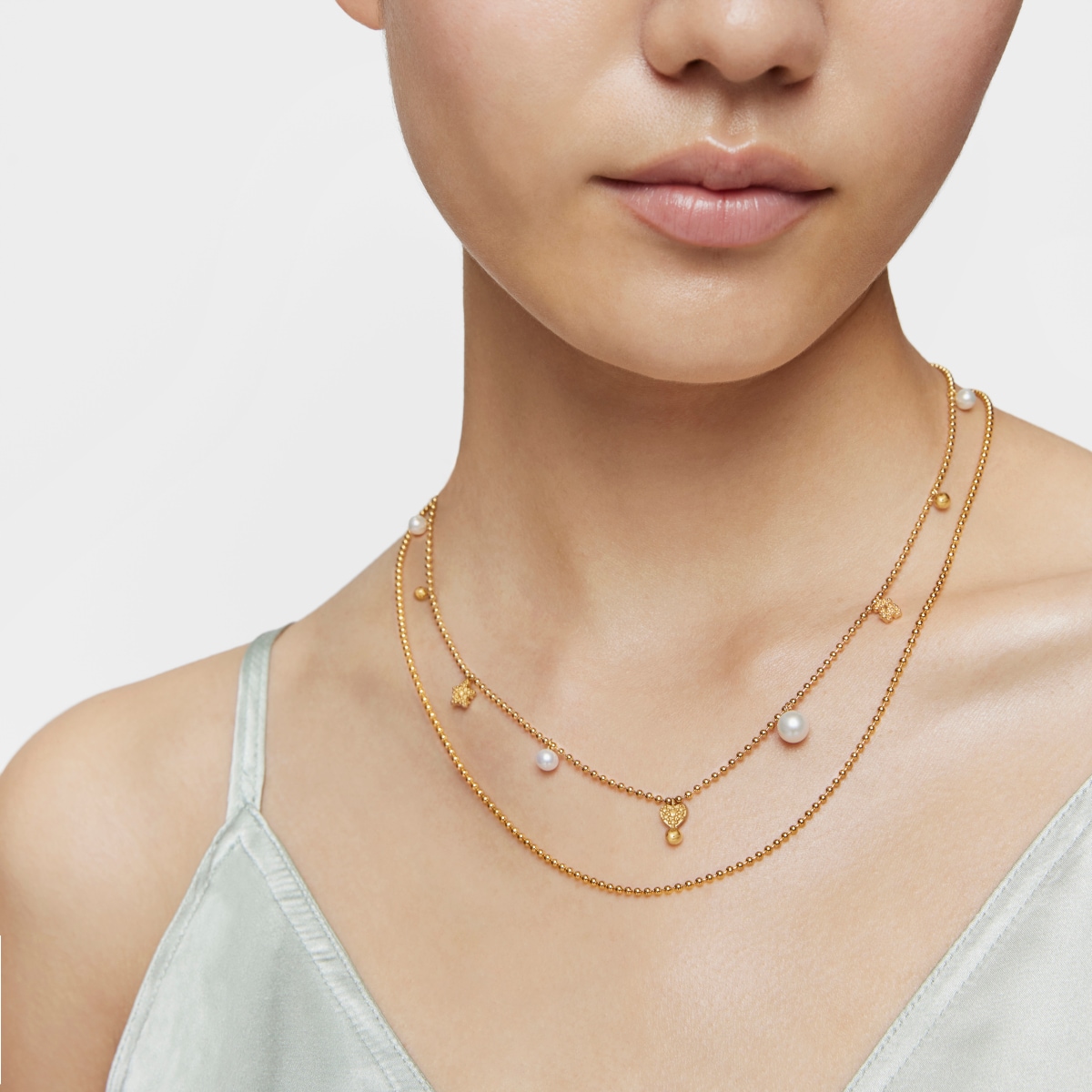 Collar corto con baño de oro de 18 kt sobre plata, perlas cultivadas y motivos TOUS Grain
