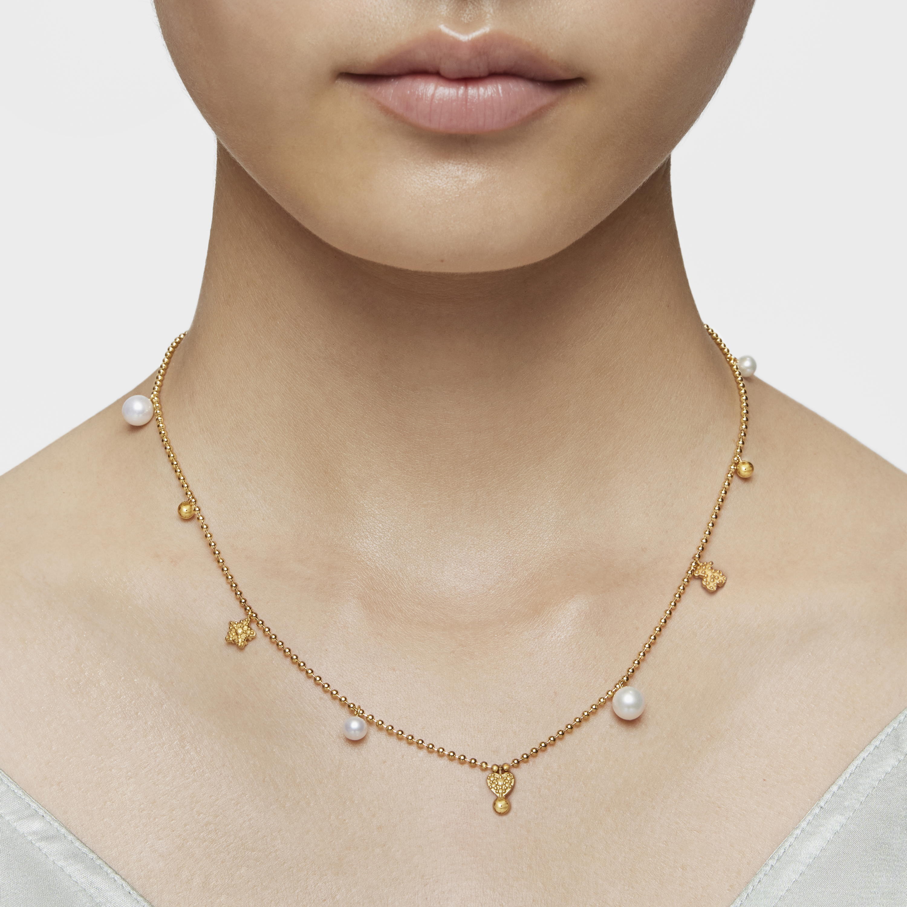 Short Necklace with 18K gold vermeil, cultured pearls and motifs TOUS Grain