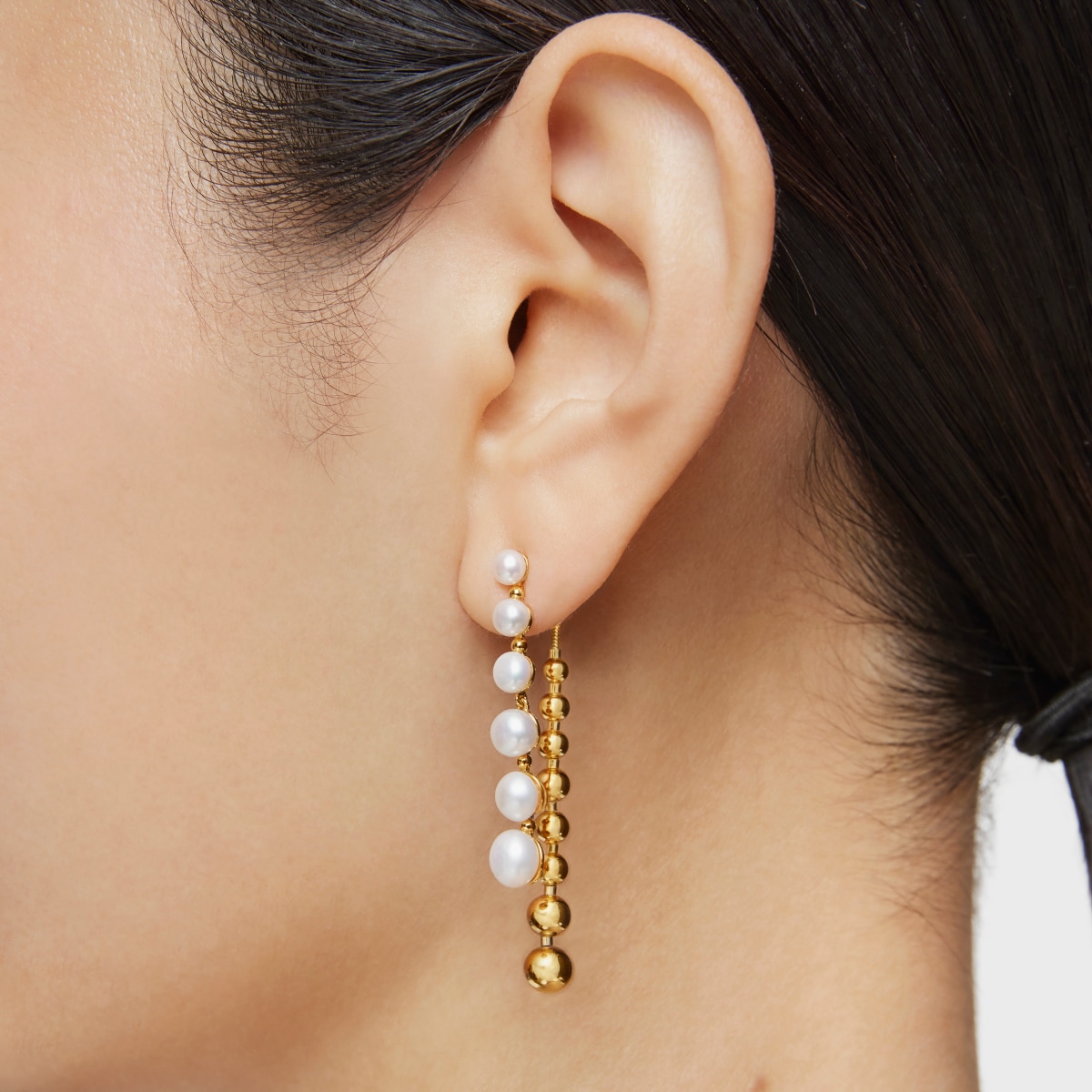 Long double Earrings with 18kt gold plating over silver and cultured pearls Gloss
