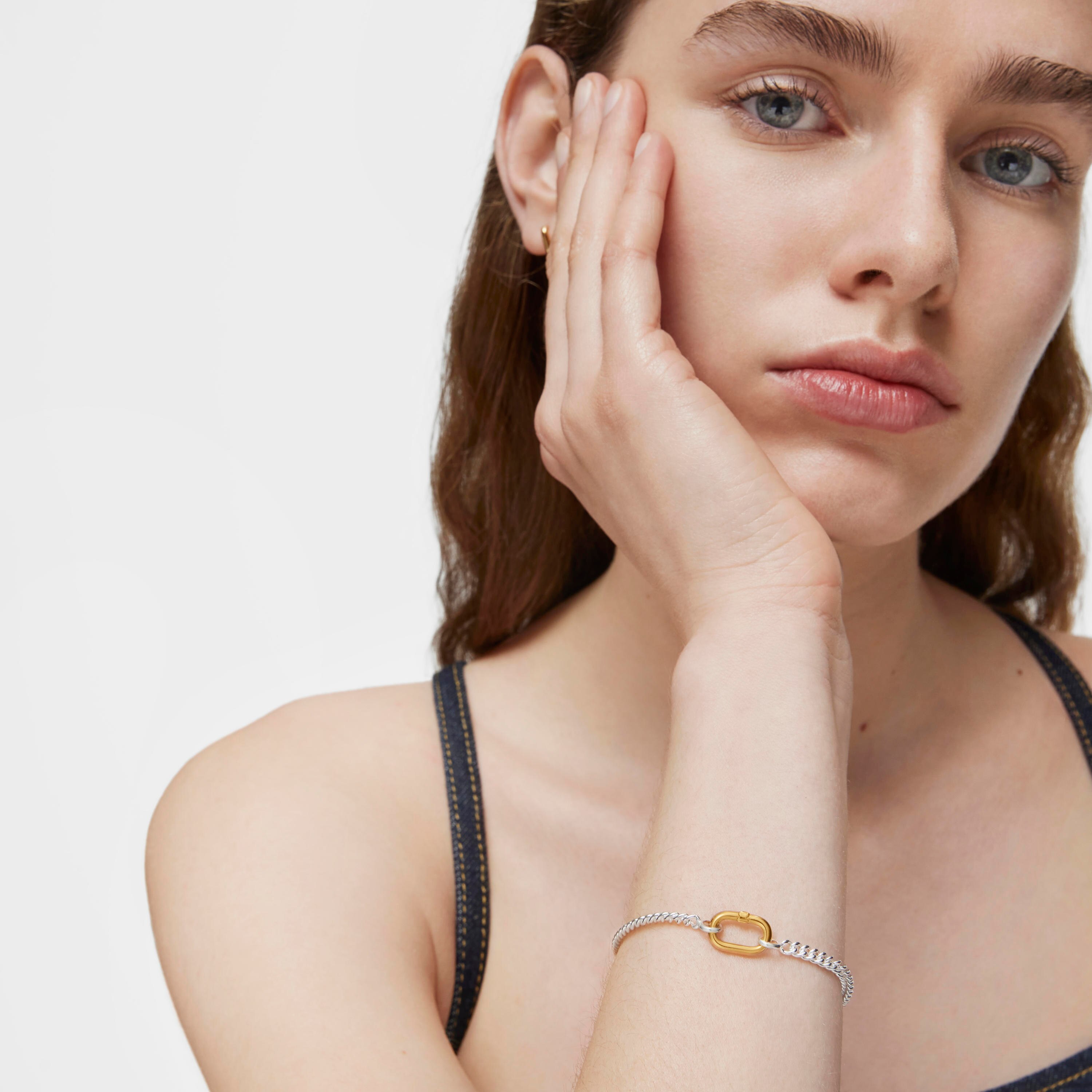 Silver Bracelet with two-tone ring Hold Oval