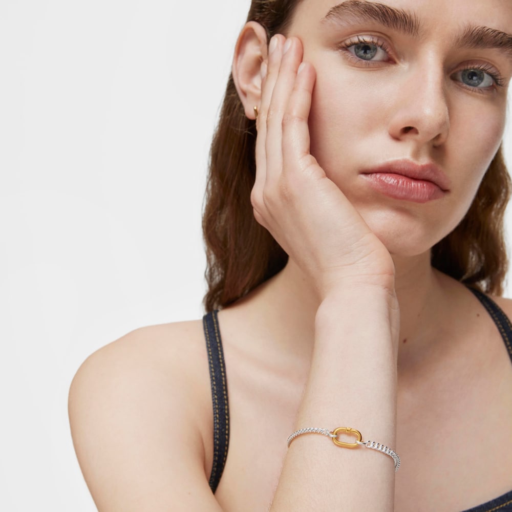 Pulsera de plata con anilla bicolor Hold Oval