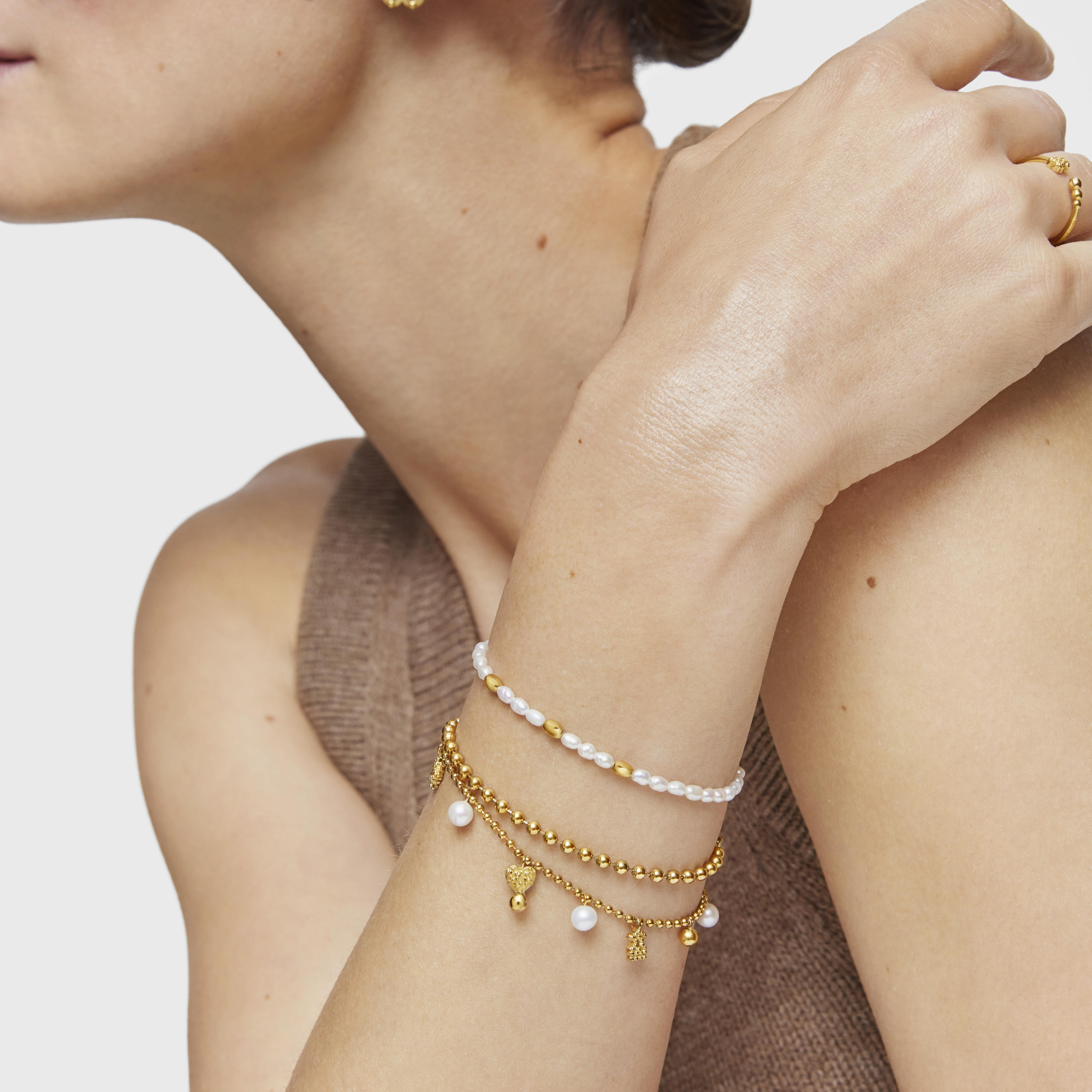 Chain Bracelet with 18kt gold plating over silver and cultured pearls and motifs TOUS Grain