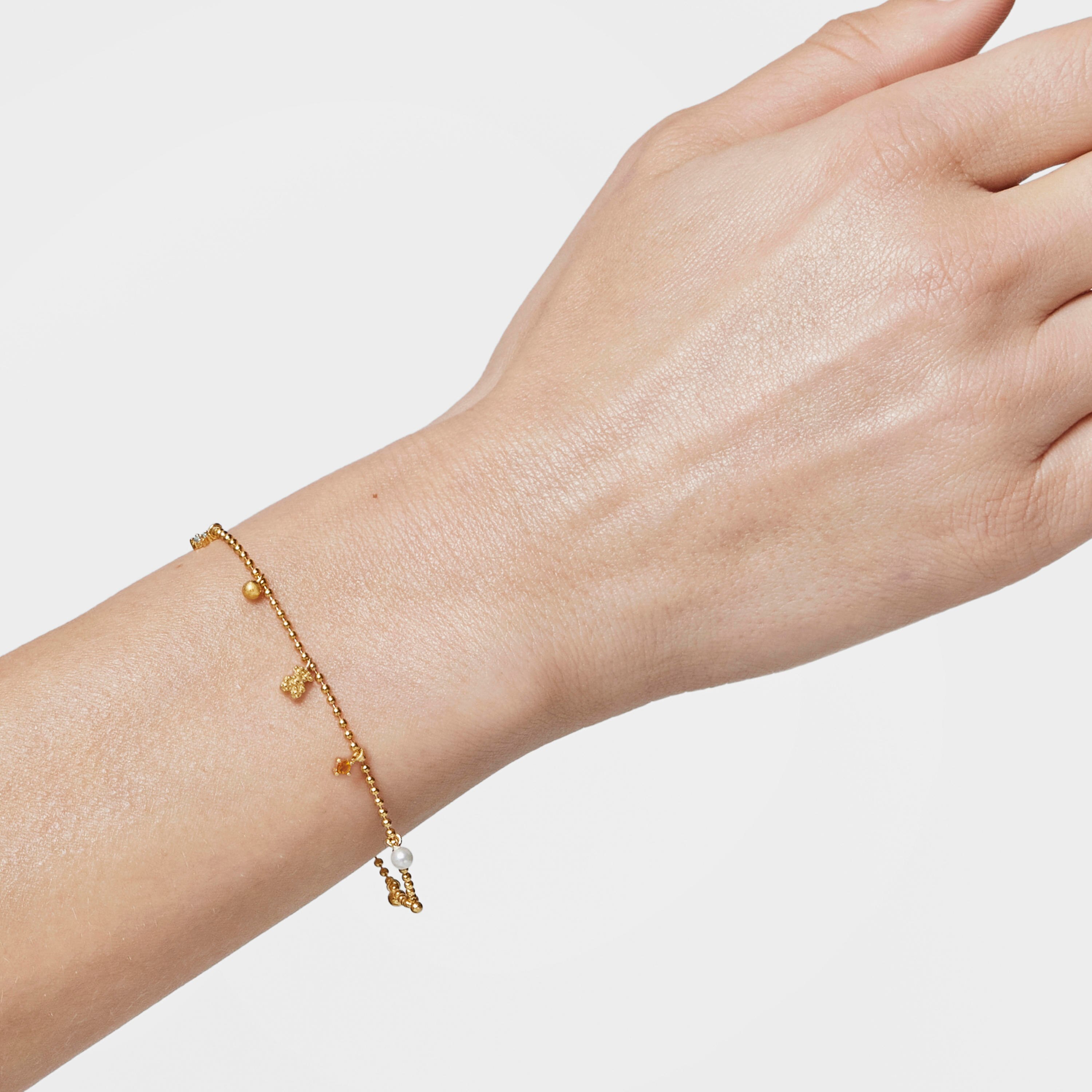 Chain Bracelet with 18kt gold plating over silver and cultured pearls and gemstones TOUS Grain