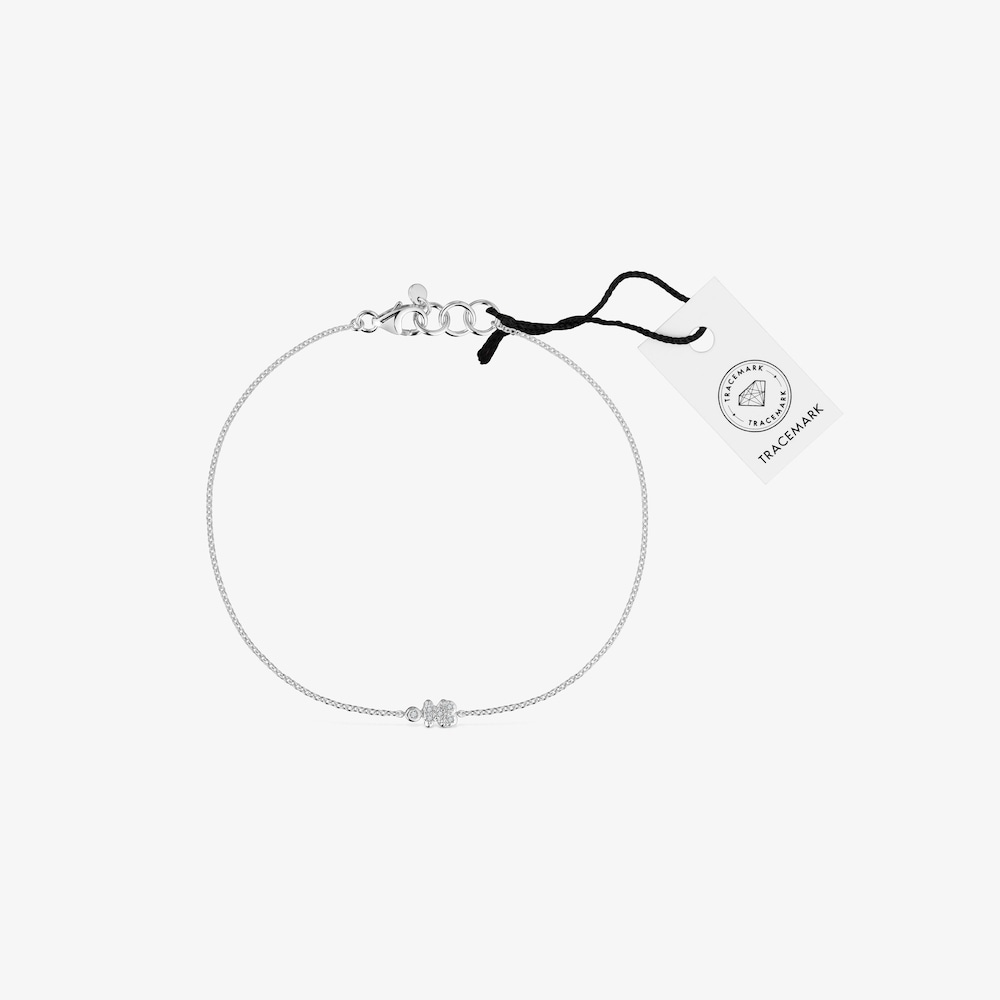 Retiazkov&yacute; n&aacute;ramok z&nbsp;bieleho zlata s&nbsp;medved&iacute;kom a&nbsp;diamantmi TOUS Grain