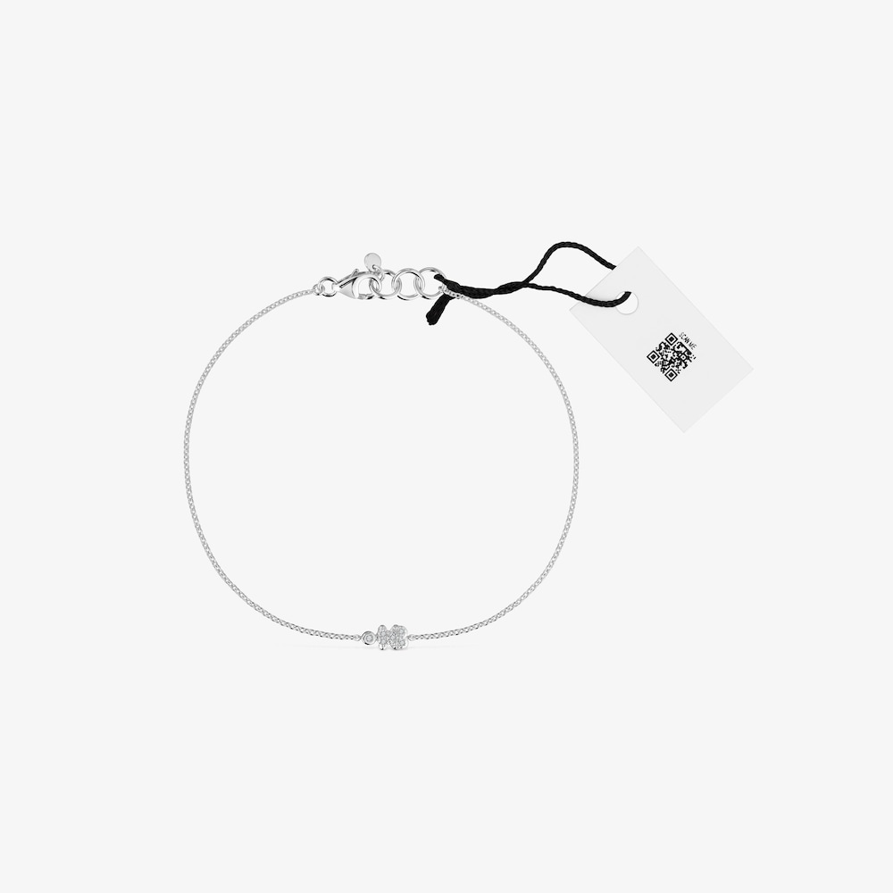 Retiazkov&yacute; n&aacute;ramok z&nbsp;bieleho zlata s&nbsp;medved&iacute;kom a&nbsp;diamantmi TOUS Grain