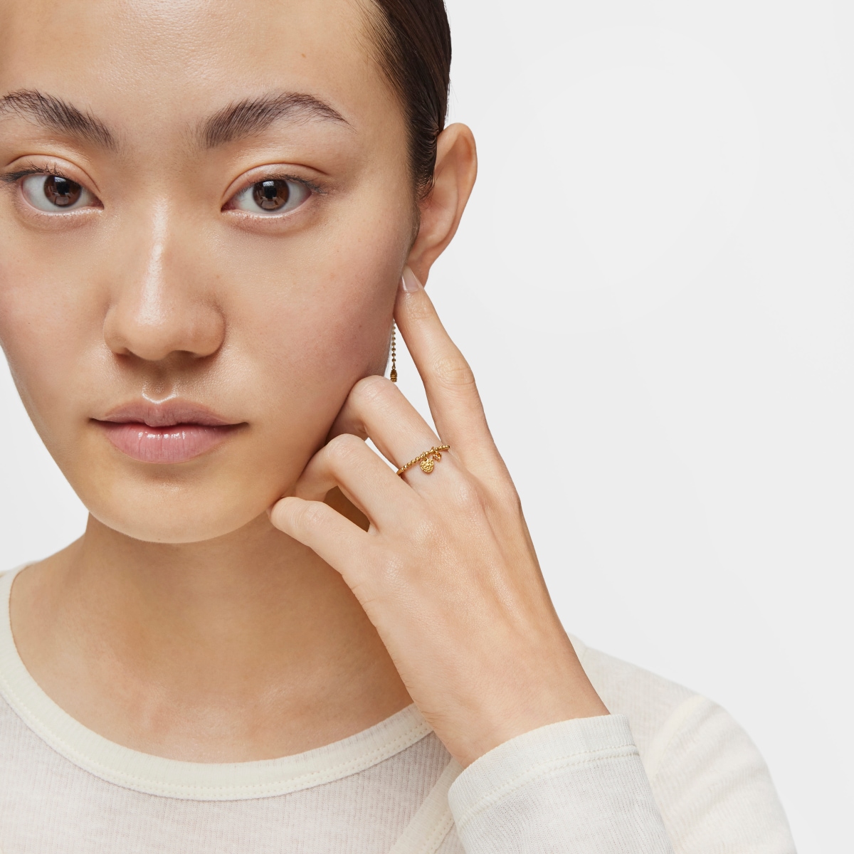 Anillo pequeño con baño de oro de 18 kt sobre plata y granate naranja TOUS Grain