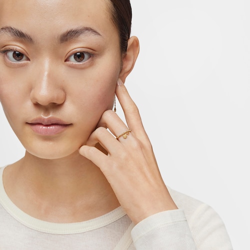Anillo pequeño con baño de oro de 18 kt sobre plata y granate naranja TOUS Grain