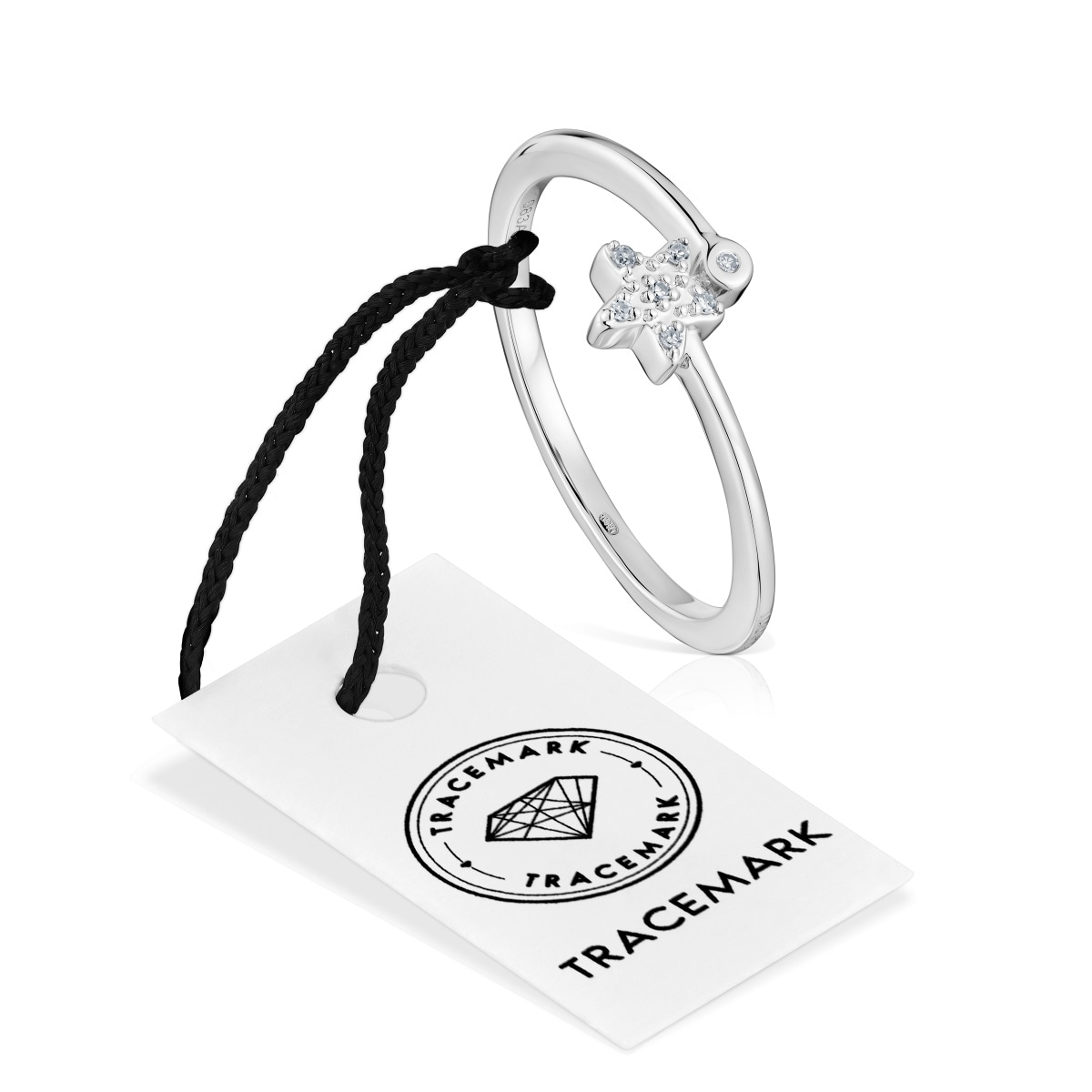 Anillo pequeño estrella de oro blanco con diamantes TOUS Grain