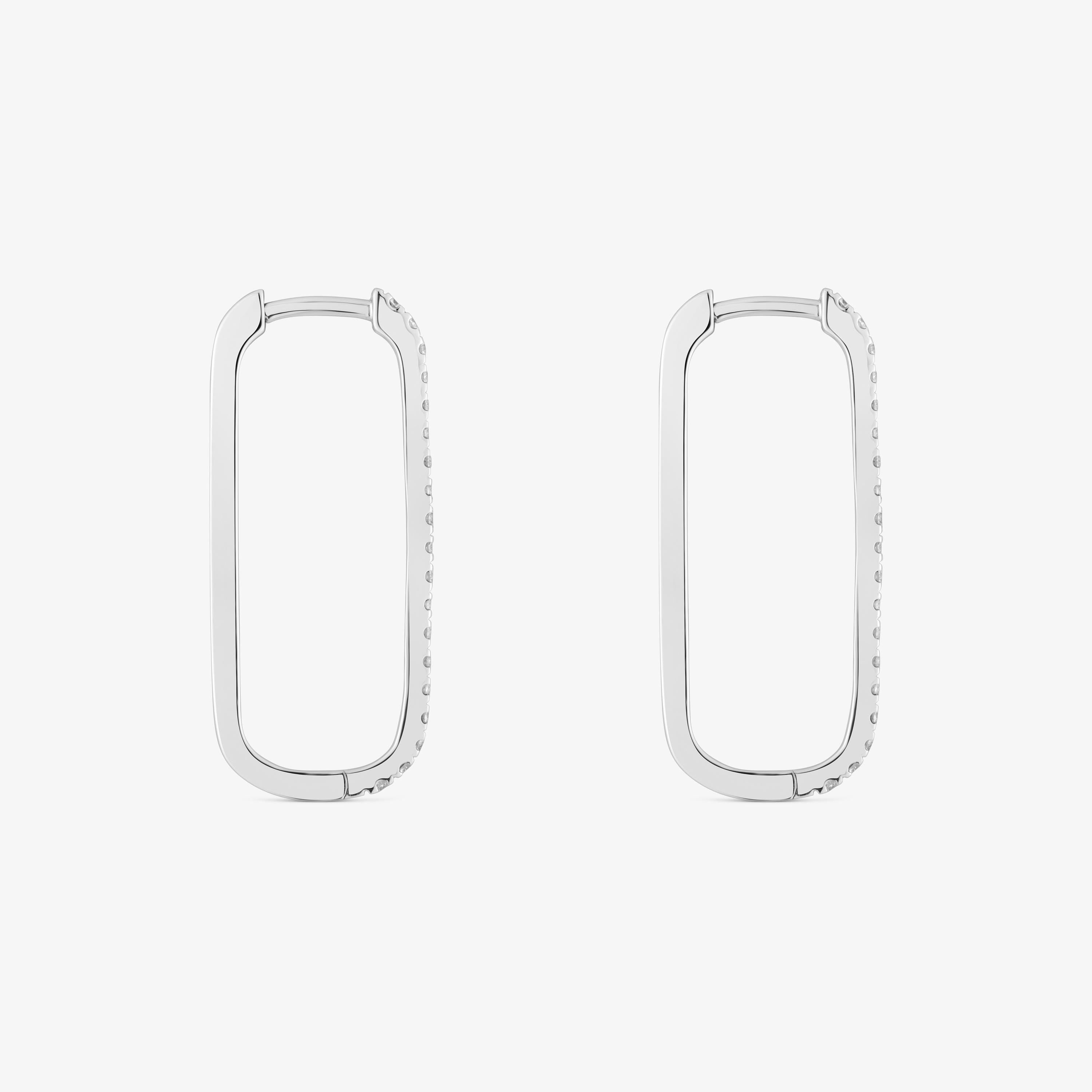 Long oval hoop Earrings in 18K white gold with diamonds Les Classiques