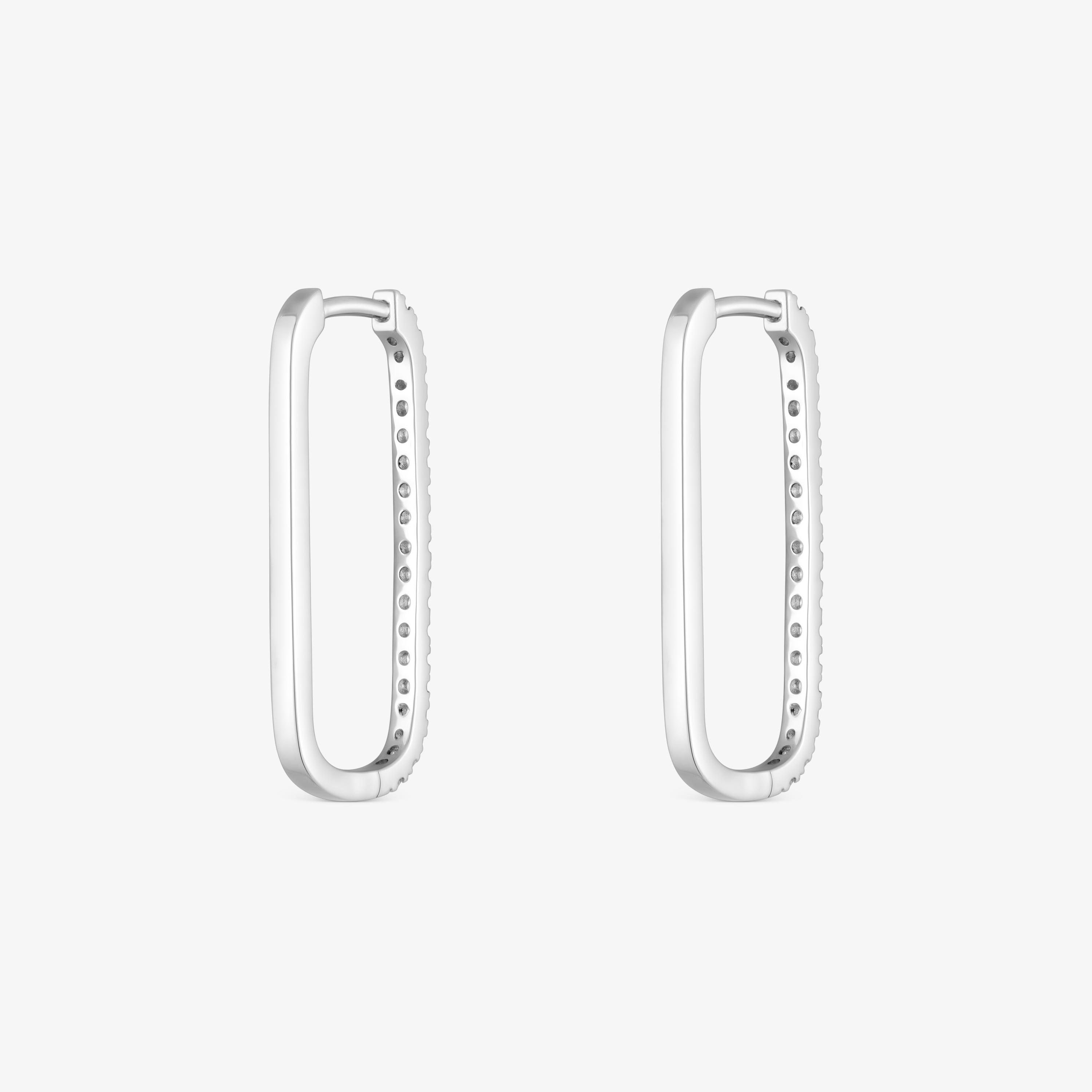 Long oval hoop Earrings in 18K white gold with diamonds Les Classiques