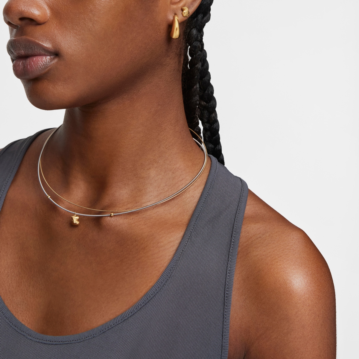 Short gold and steel Necklace with bear motif Mesh Tube