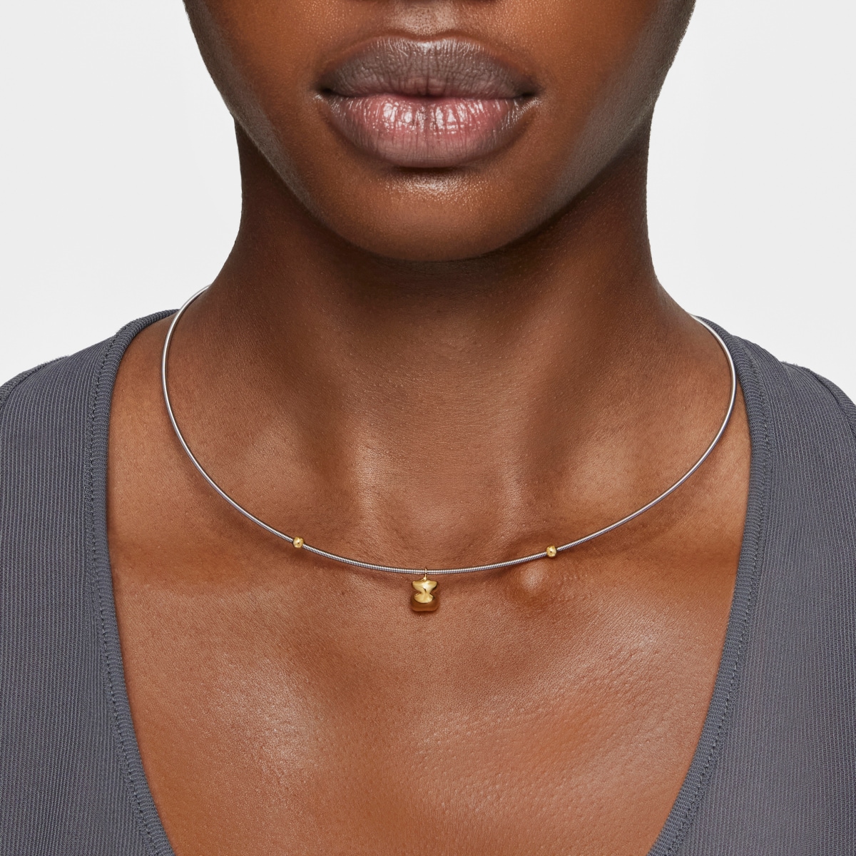 Short gold and steel Necklace with bear motif Mesh Tube