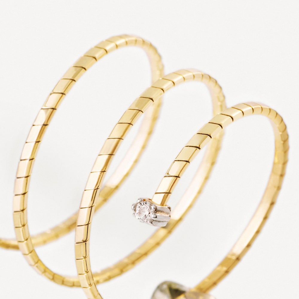 Pierścionek podw&oacute;jna spirala ze złota z diamentami TOUS ATELIER