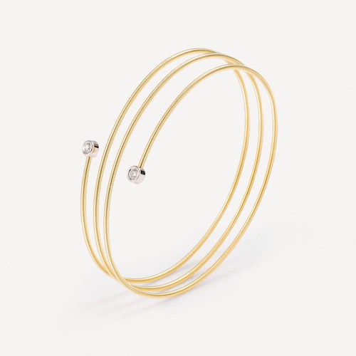 Pulseira espiral em ouro com dois diamantes TOUS ATELIER