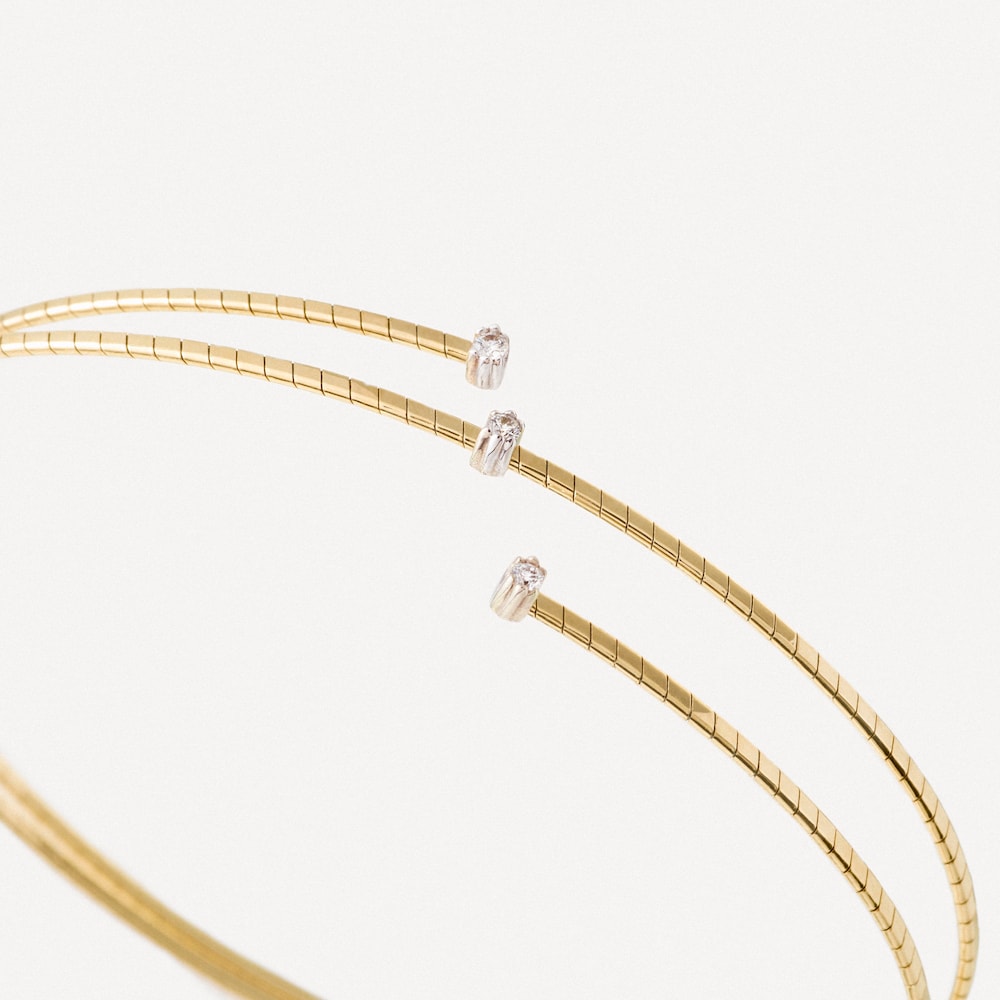 Zlat&yacute; Spir&aacute;lov&yacute; n&aacute;ramek se třemi diamanty TOUS ATELIER