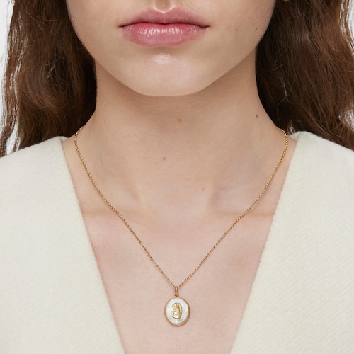 Gold and mother-of-pearl virgin Medallion pendant Devotion