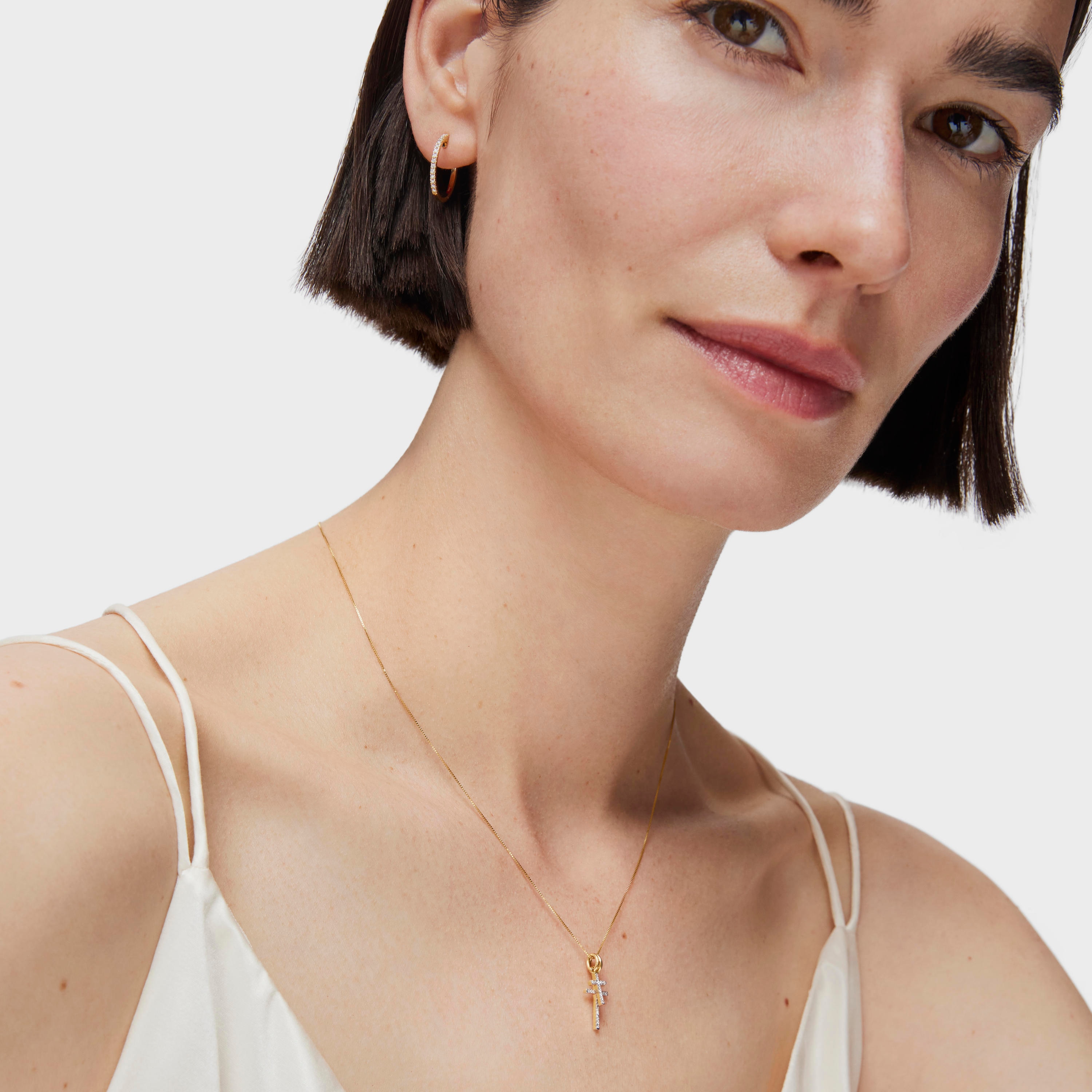 Small gold and diamonds cross Pendant Basics