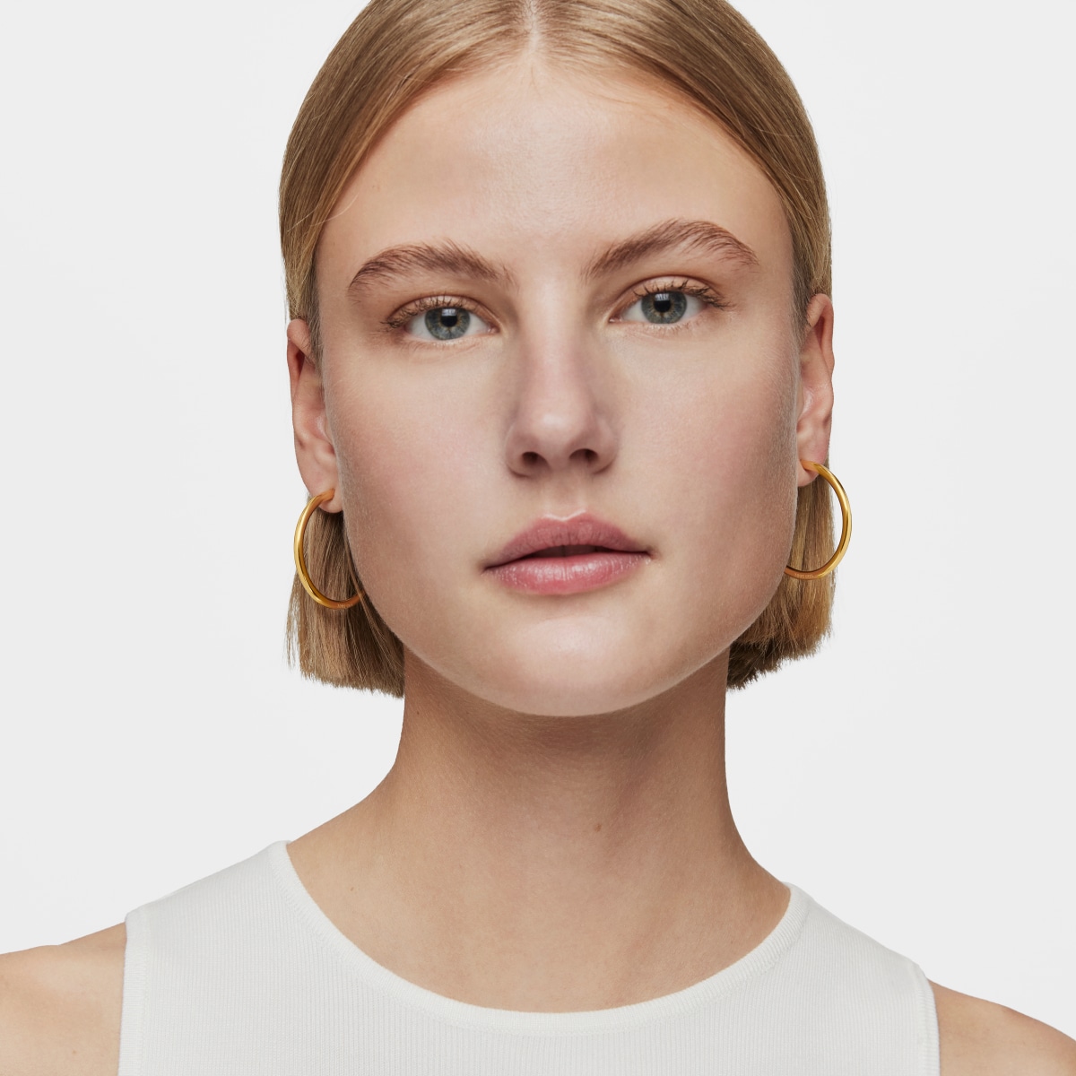 Long 38 mm Hoop earrings with 18kt gold plating over silver Basics