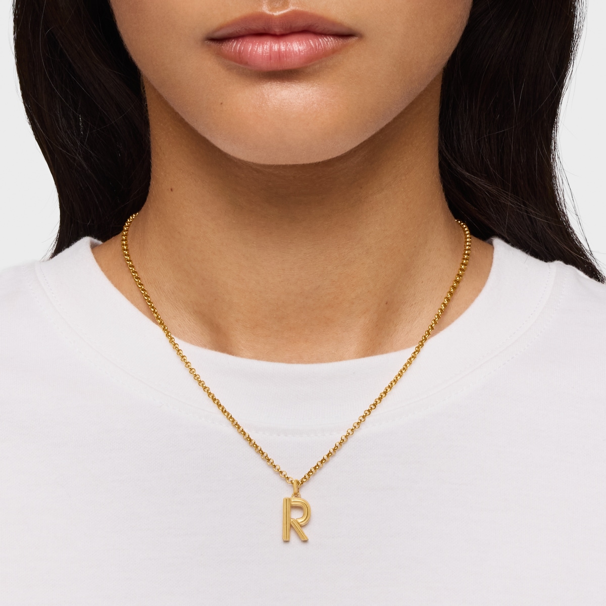 Colgante mediano letra R con baño de oro 18 kt sobre plata Alphabet