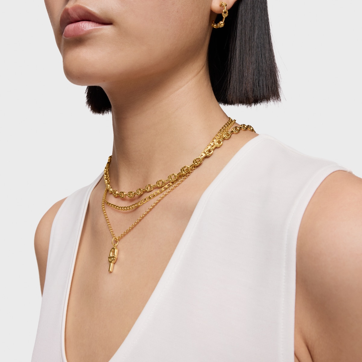 Colgante pequeño con baño de oro 18 kt sobre plata TOUS MANIFESTO
