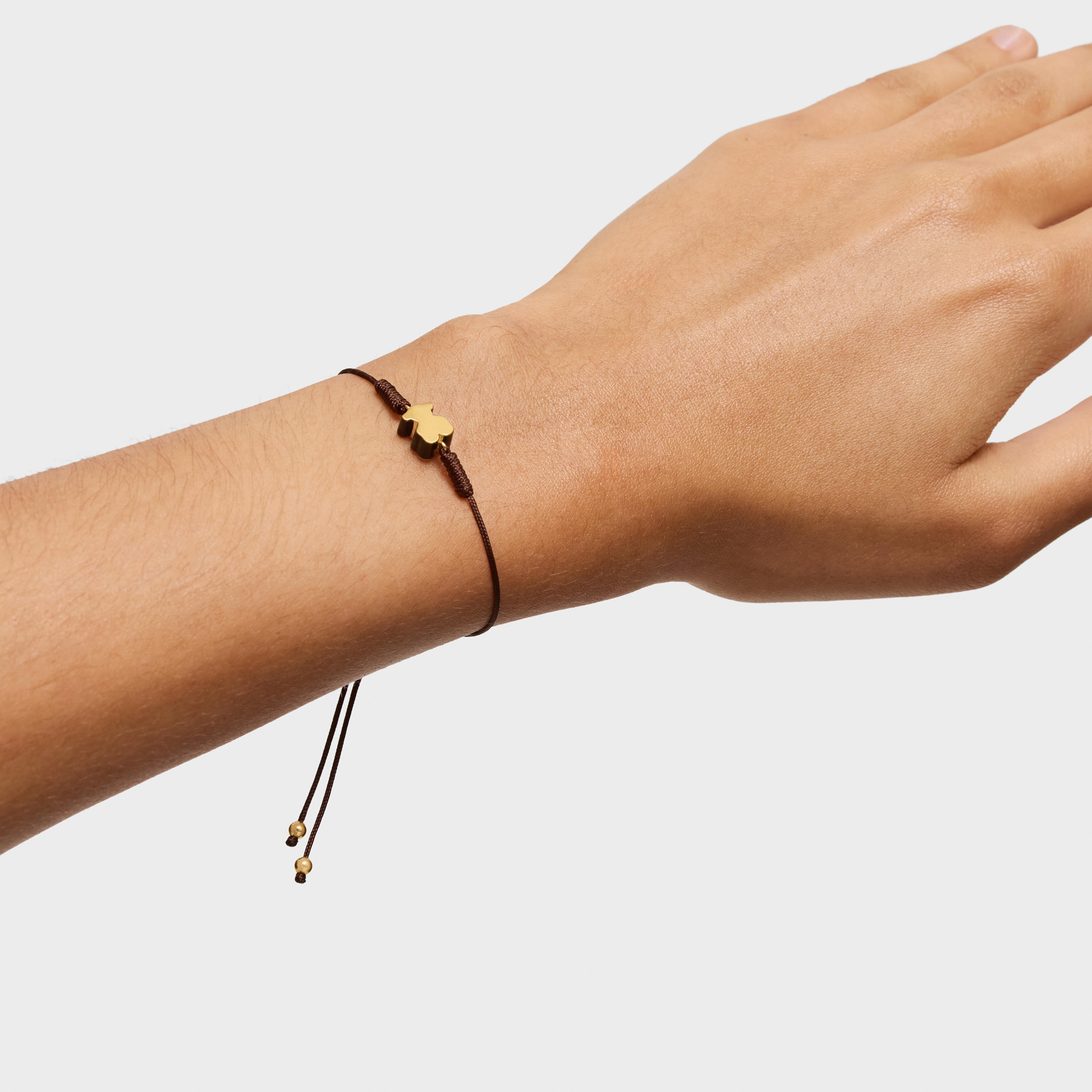 Nylon Bracelet with 18K solid gold bear motif and tiger’s eye TOUS 1950