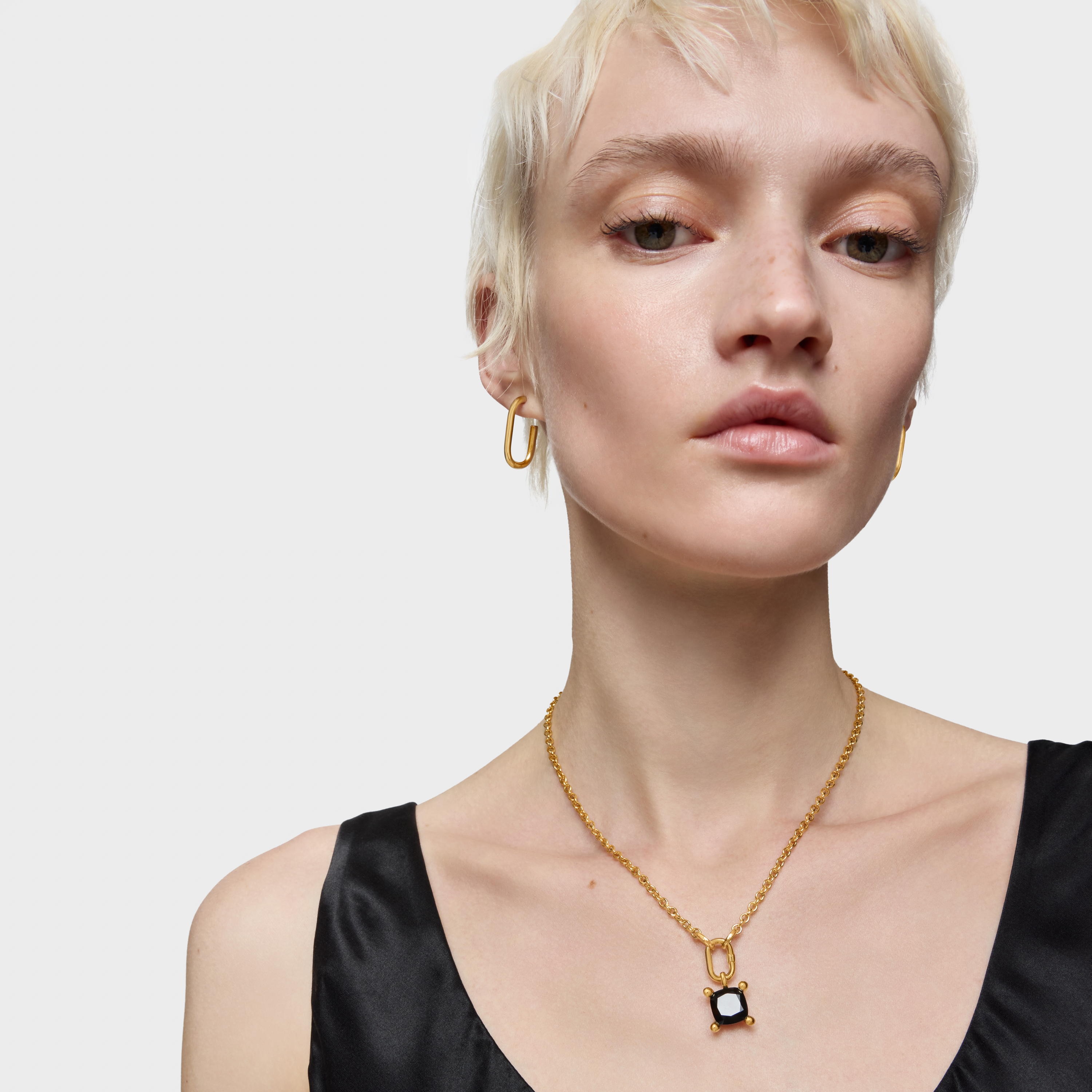 Small 18kt gold plating over silver bear Pendant with onyx Color Black