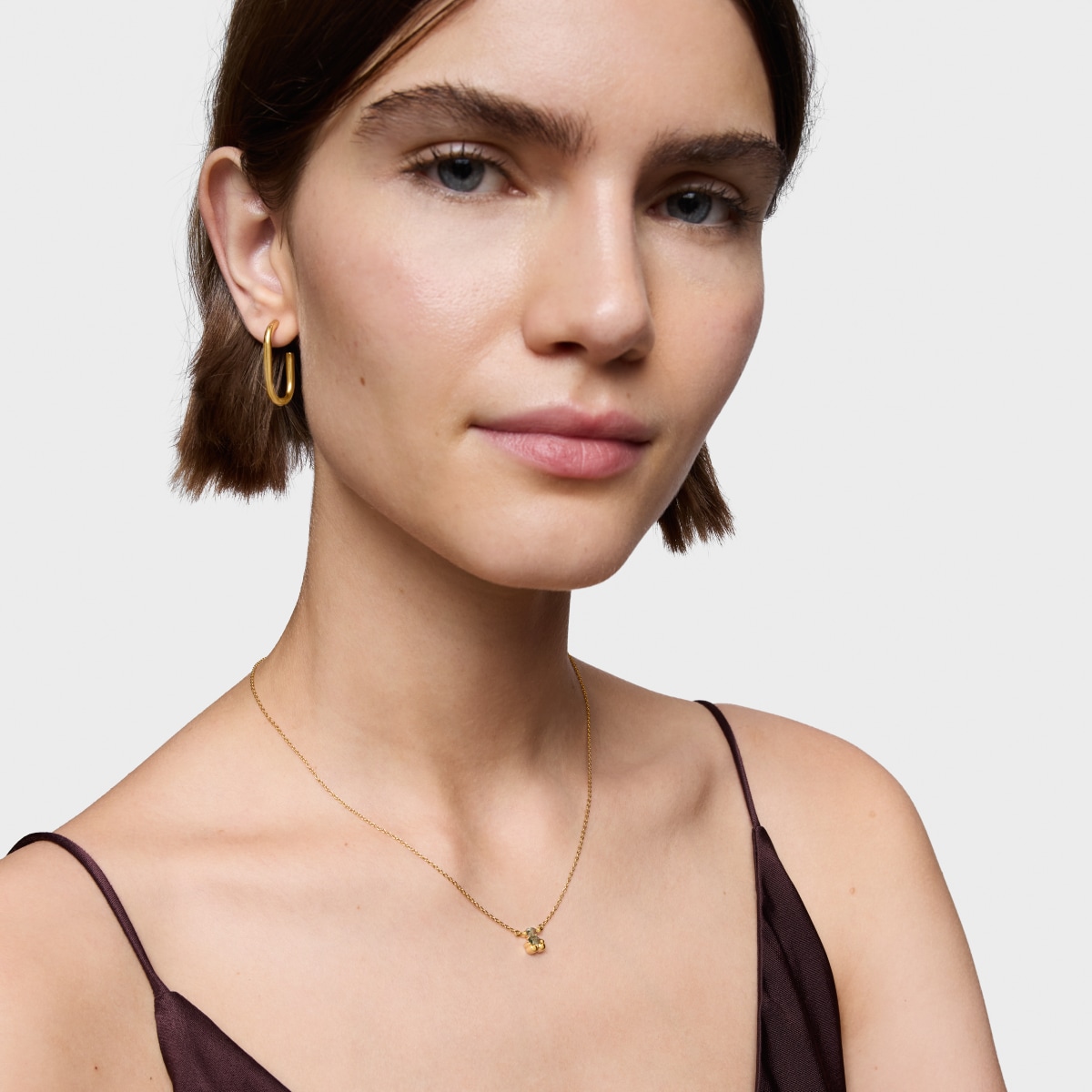 Short 18kt gold plating over silver bear motif Necklace with lab-grown green spinel Color Bear LGG