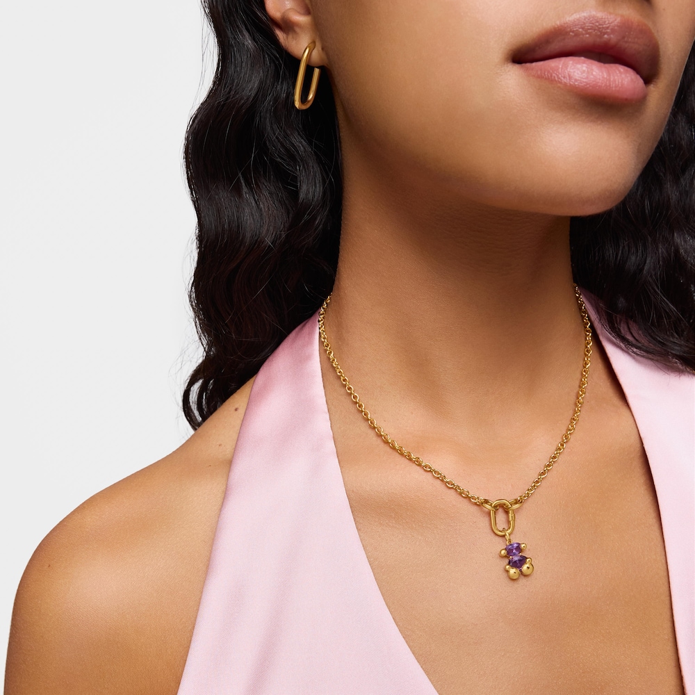 Penjoll petit motiu &oacute;s amb bany d'or 18 kt sobre plata i safir lila creat al laboratori Color Bear LGG