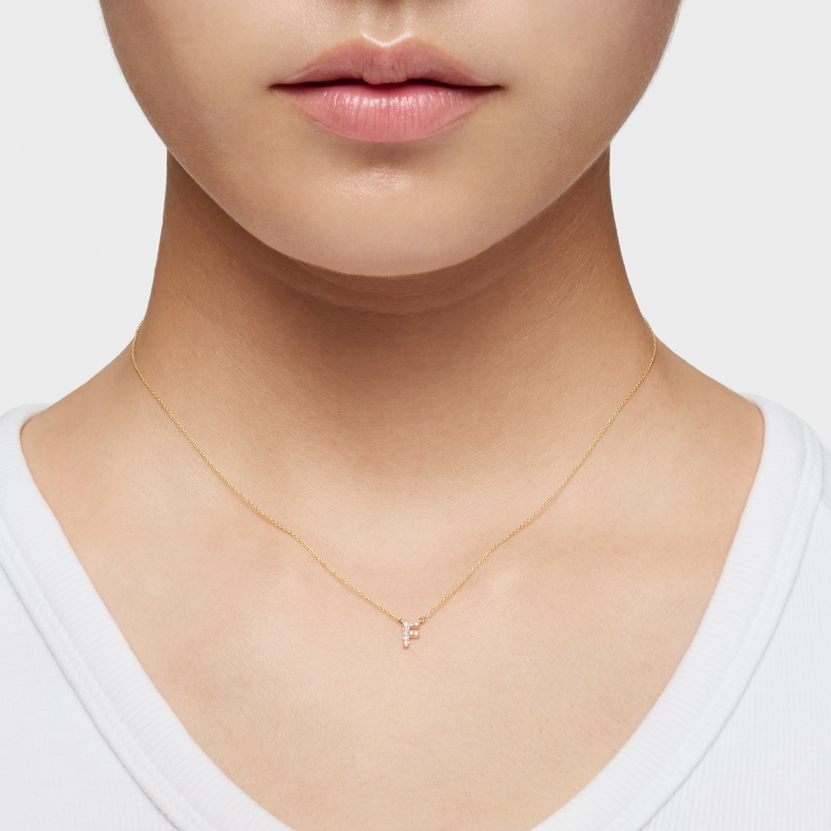 Short gold letter F Necklace with 0,05 ct diamonds Alphabet