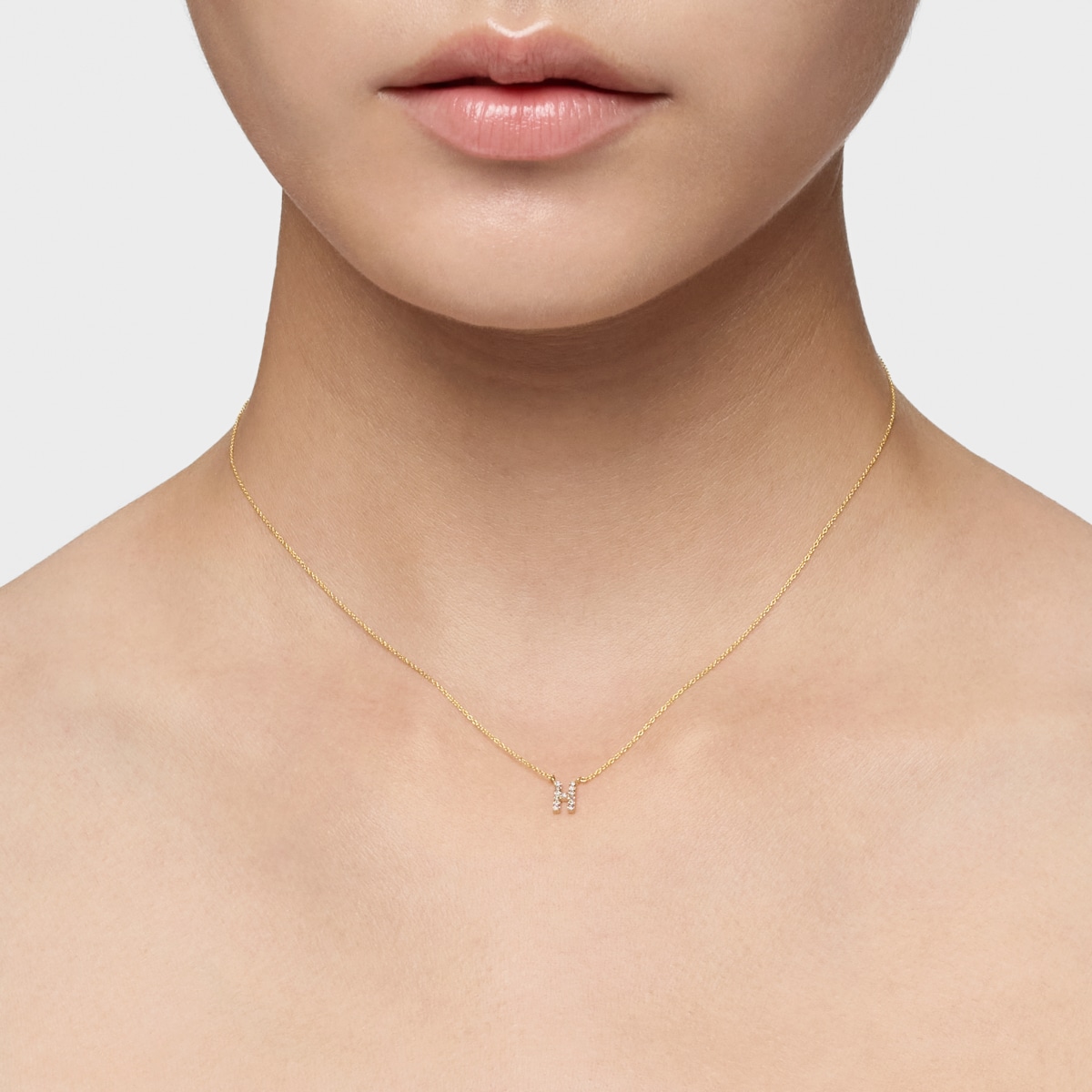 Short gold letter H Necklace with 0,05 ct diamonds Alphabet