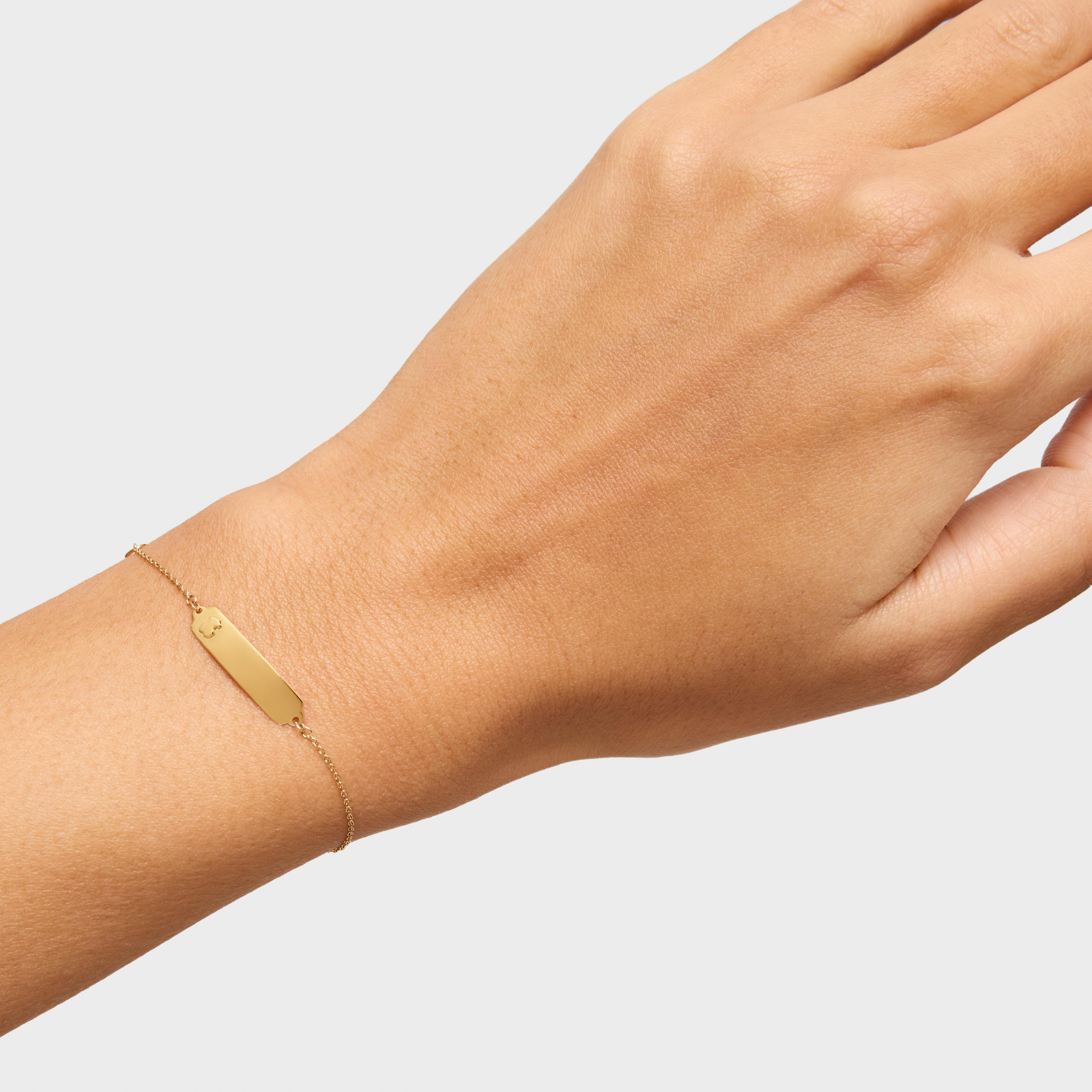 Pulsera placa de oro TOUS Baby
